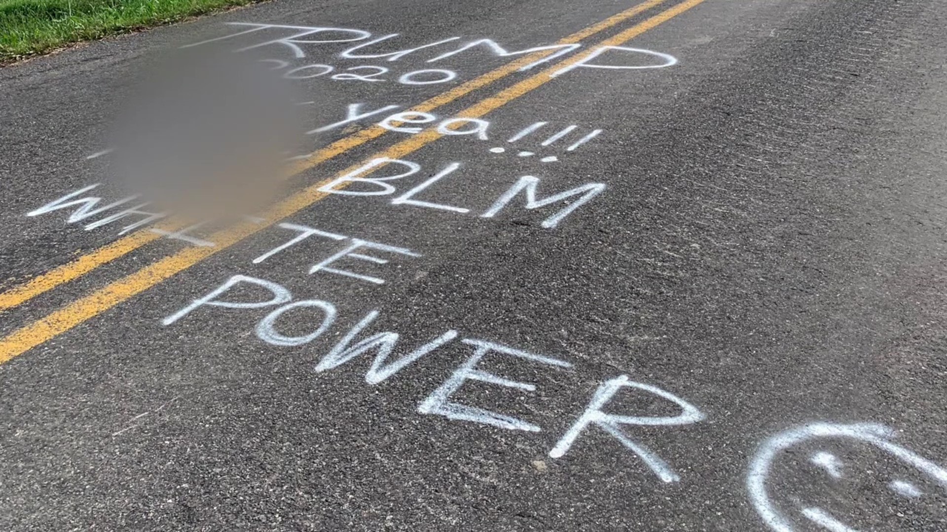 At least two roads and two intersection signs were vandalized with anti-black graffiti and swastikas.