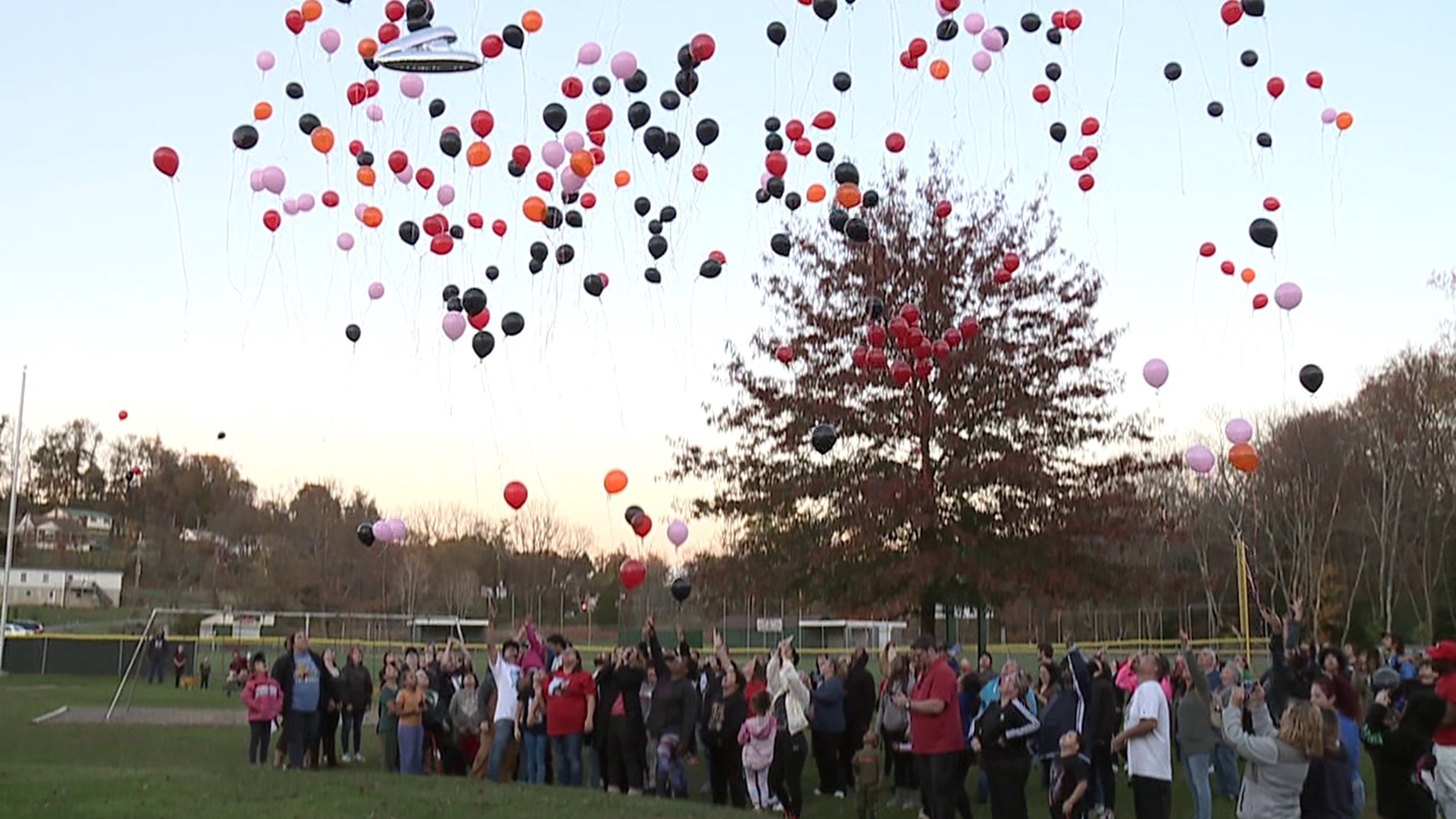 Families and friends mourn the loss of two young men; no one has been charged.