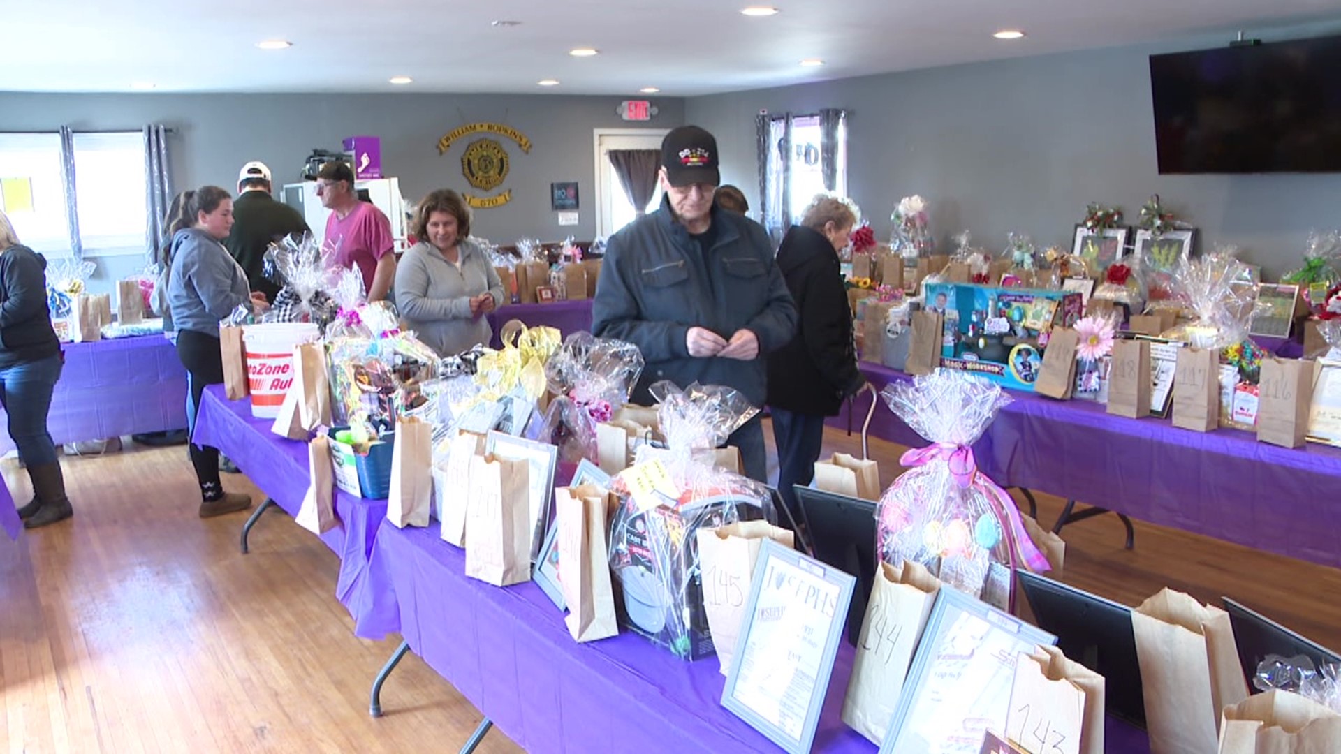The family was having trouble dealing with medical bills, so the community decided to step in and help through a basket raffle.