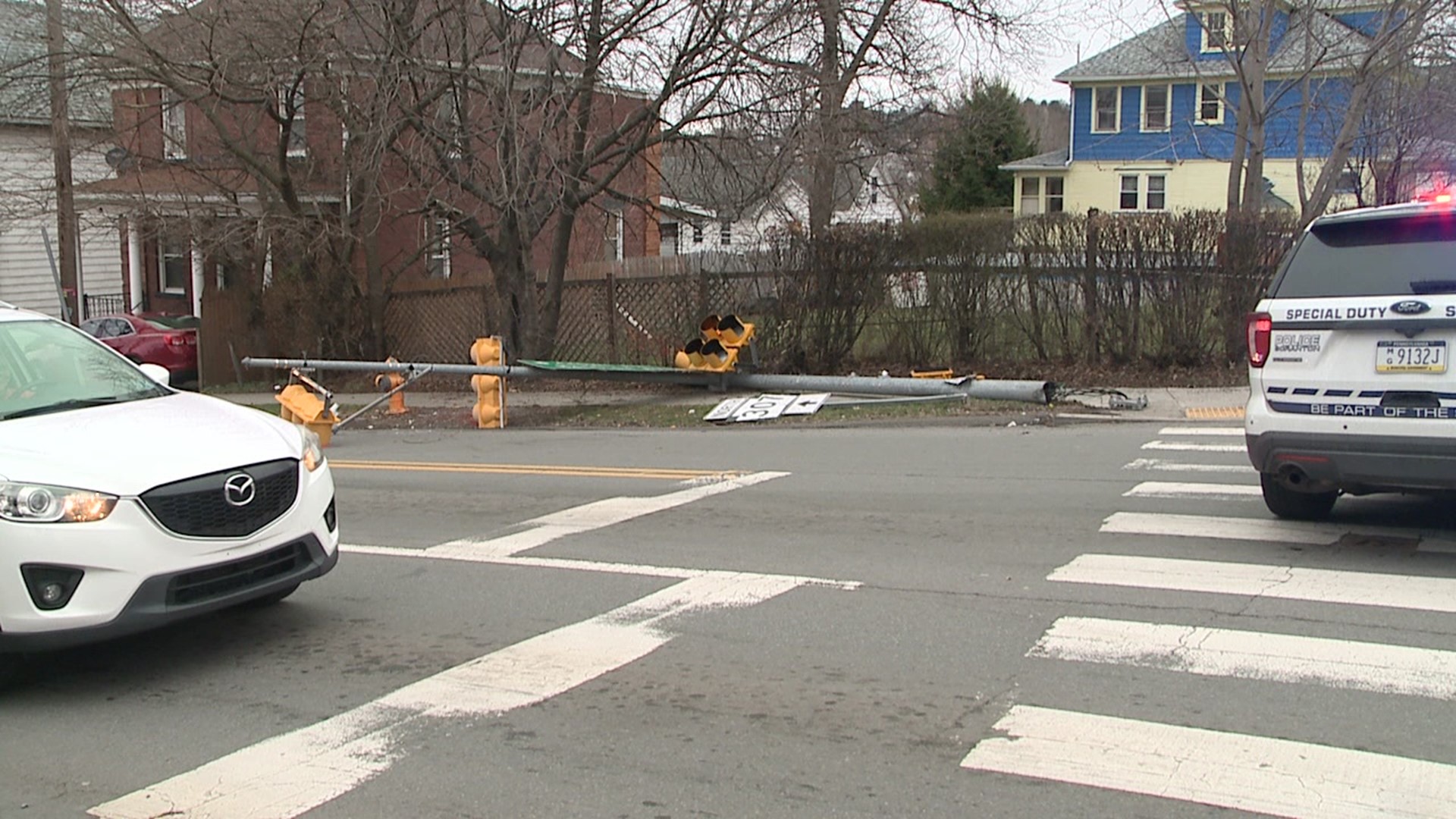 The big rig hit multiple poles, knocking down traffic lights and road signs.