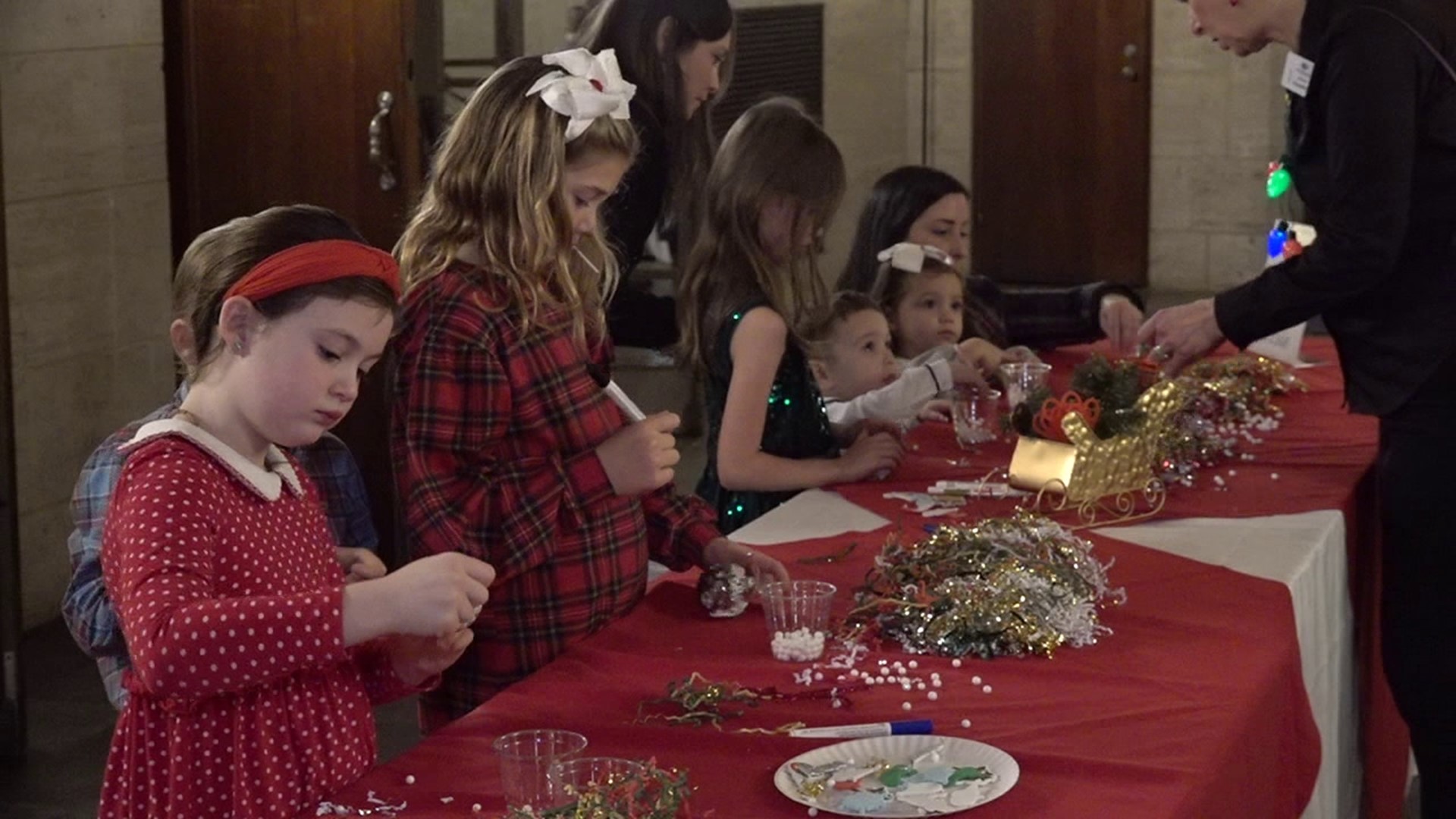 Families stopped by the Scranton Cultural Center at the Masonic Temple for the holiday event.