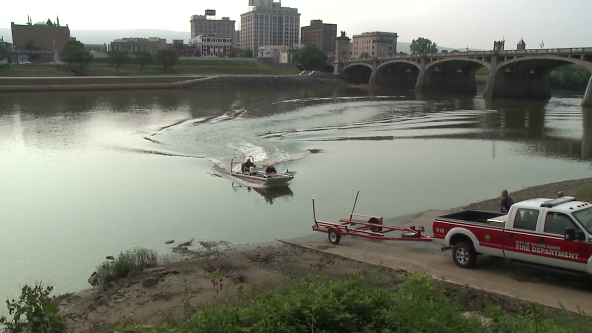 A pedestrian noticed the body in the river near the Market Street Bridge on Tuesday.