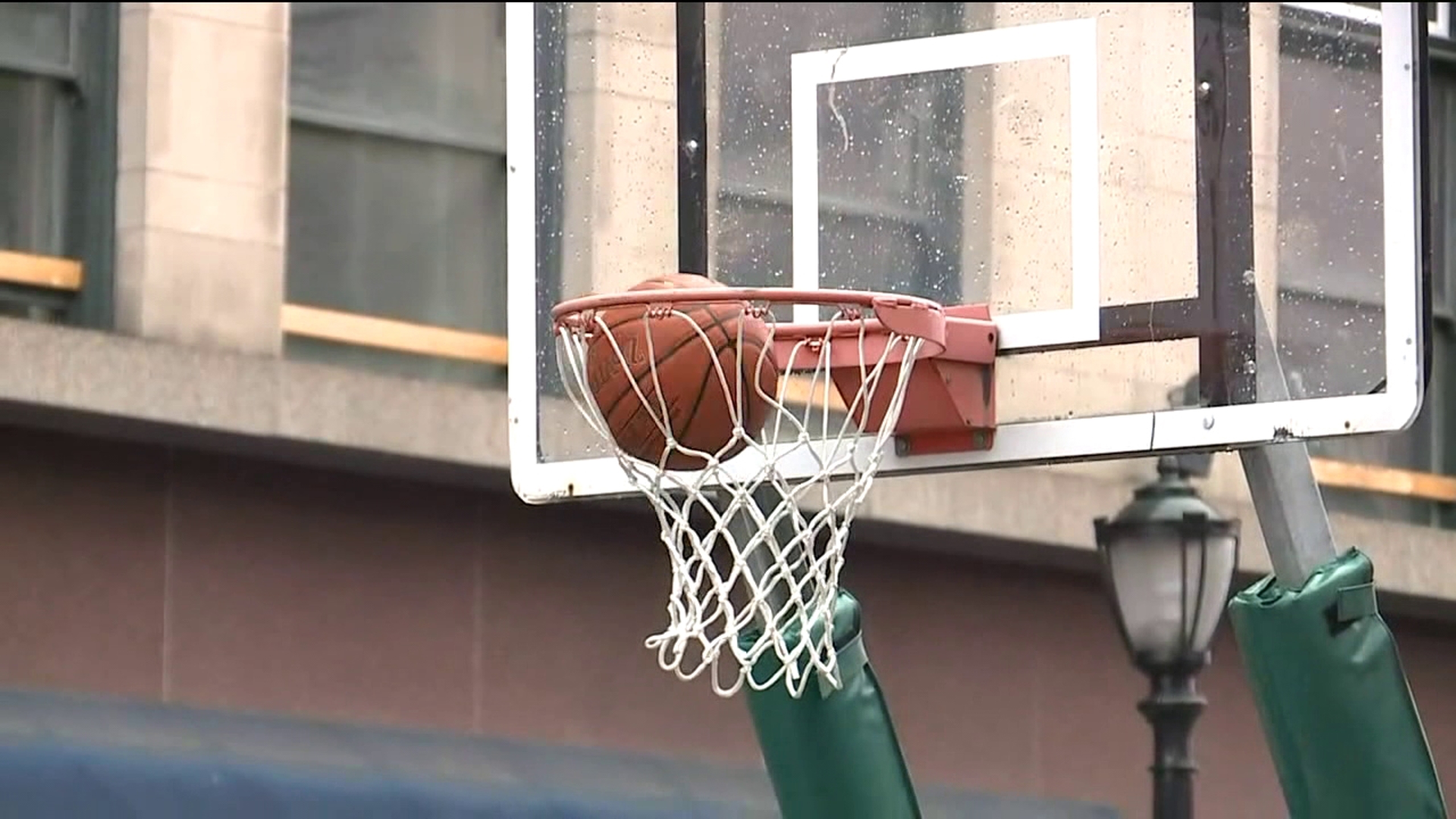 People of all ages coming together to shoot some hoops to raise money for cancer.