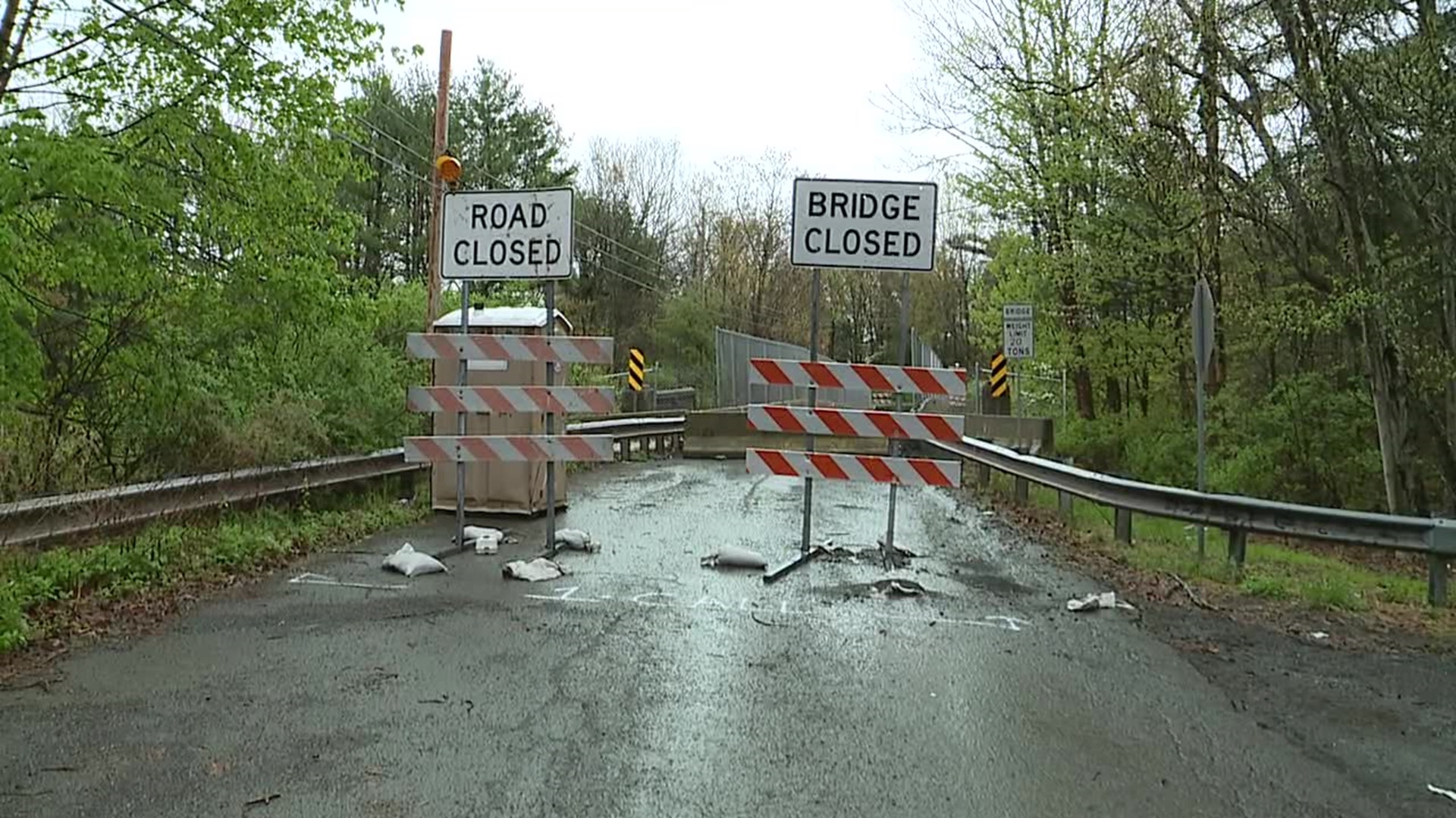 Heavy rain caused damage to a bridge that carries Station Hill Road over railroad tracks.