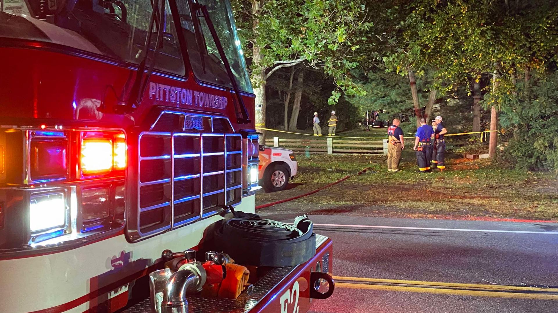 The fire happened around 6 p.m. Wednesday and destroyed a trailer that was in a wooded area.