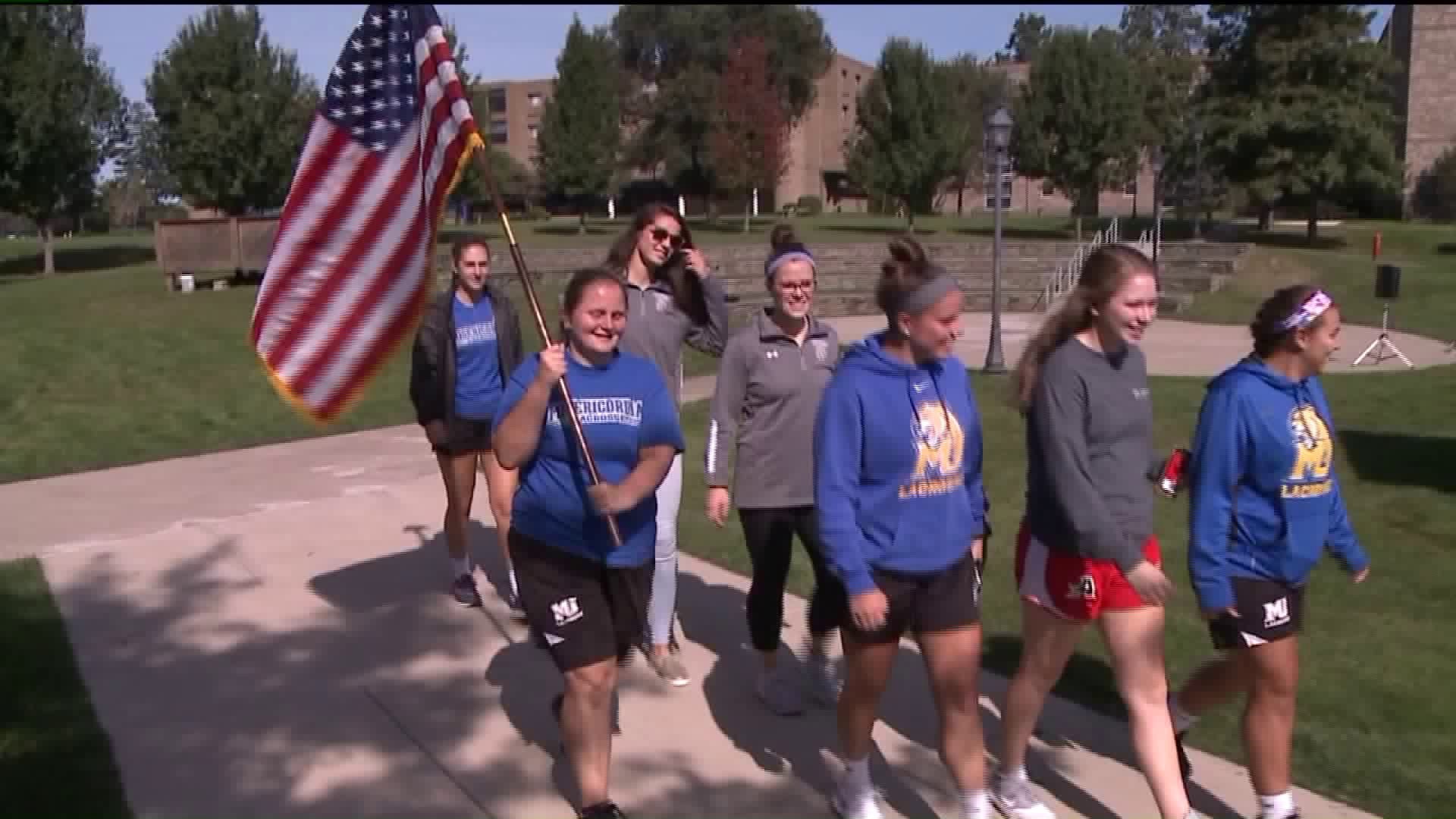 Misericordia Students Honor 9/11 with a Flag Carrying Demonstration