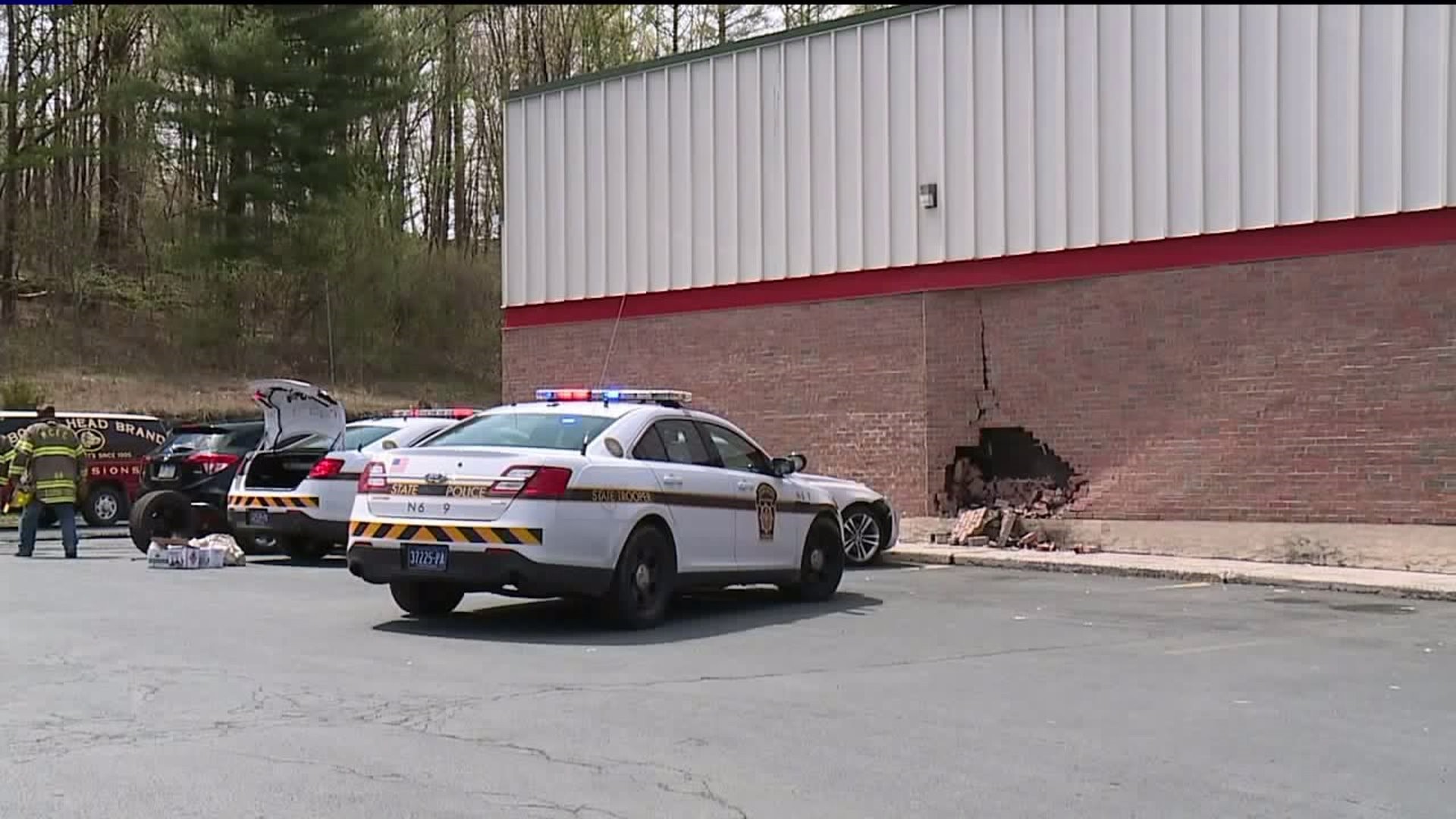 Driver Hurt, Liquor Store Damaged after Monroe County Crash