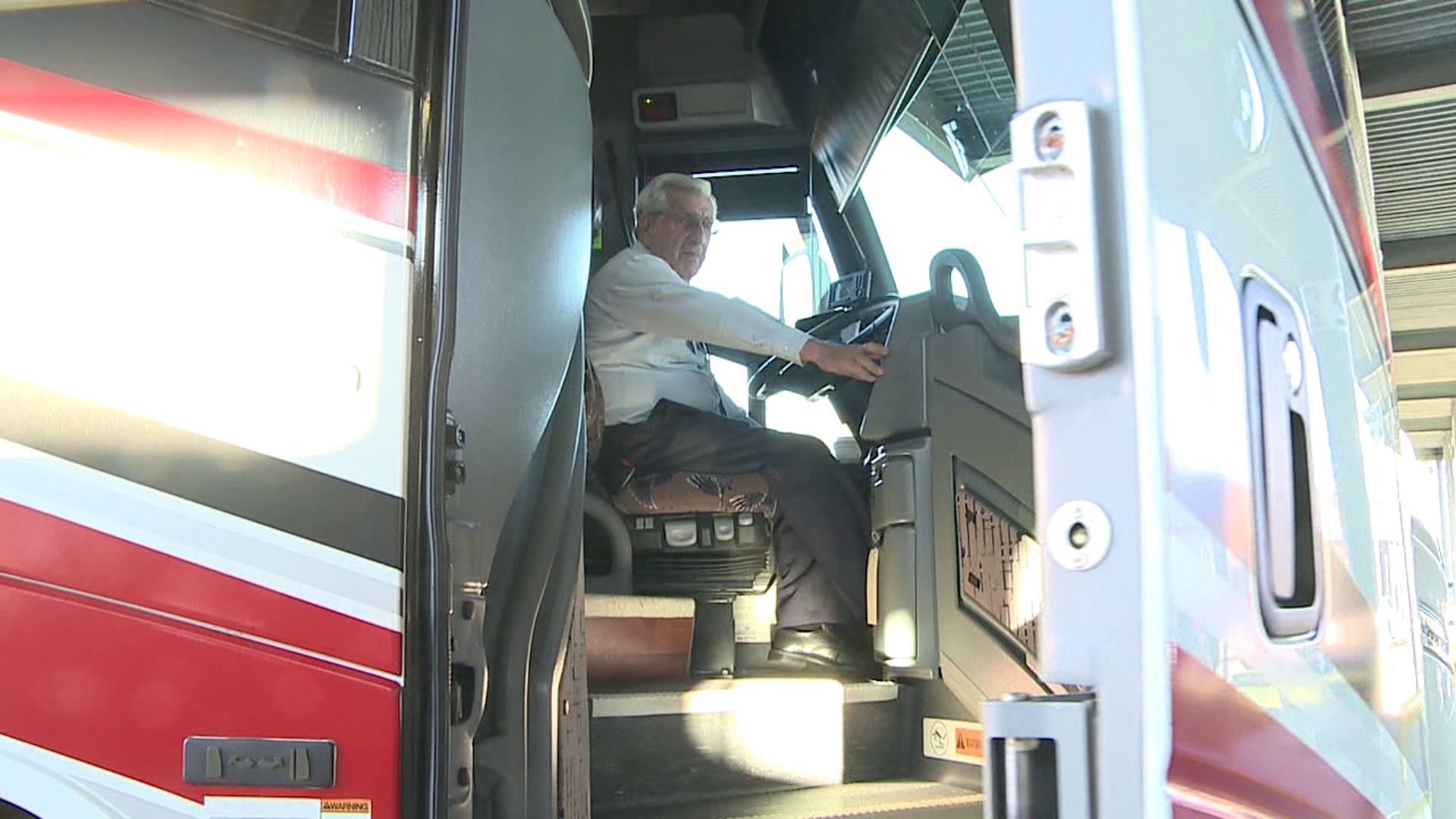 Today, a Martz bus led a procession from the funeral home to a church in Kingston for funeral services for Ray Komski, a bus driver for 47 years.