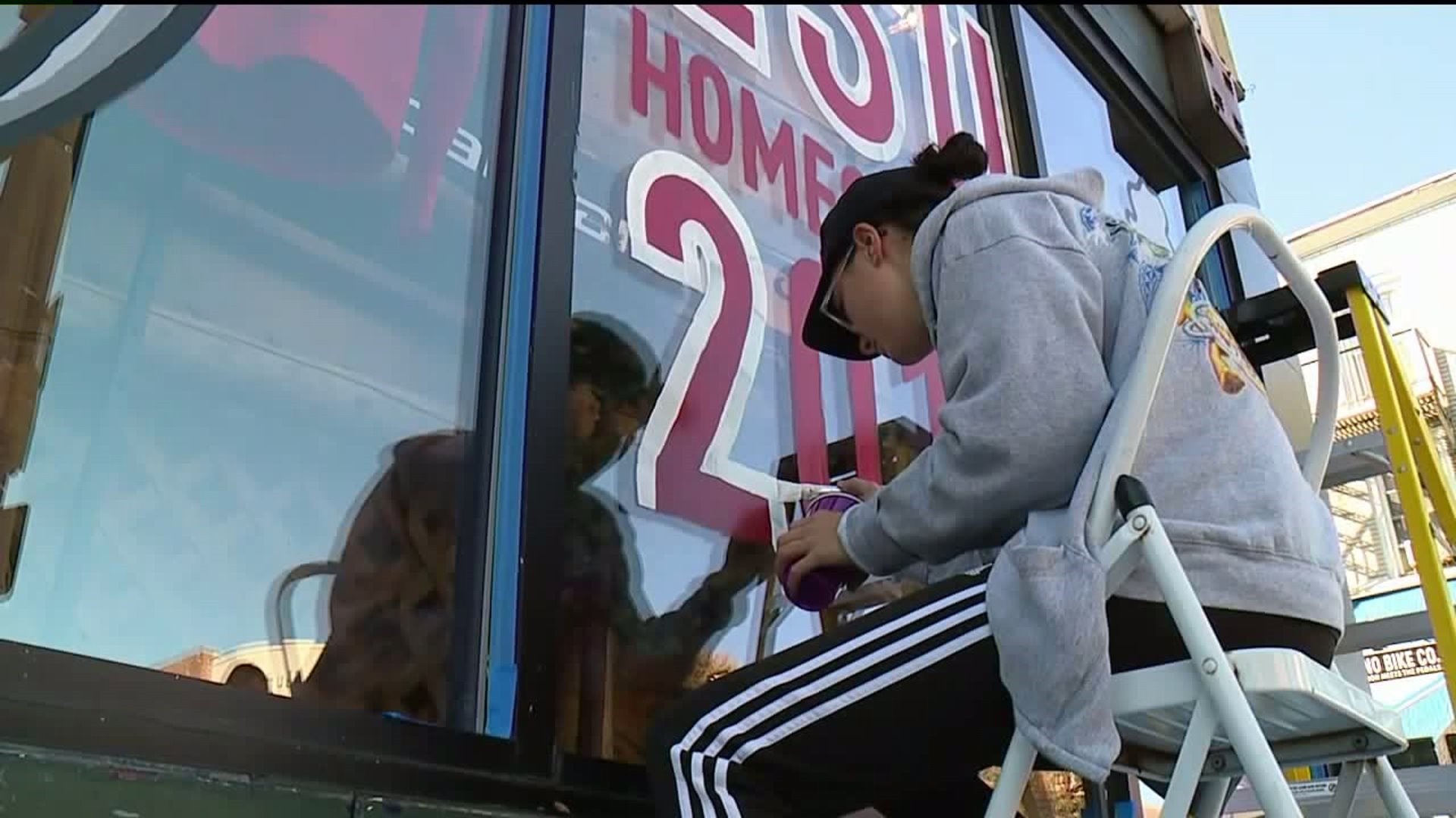 East Stroudsburg University Graphic Design Students Paint Storefront Windows for Homecoming