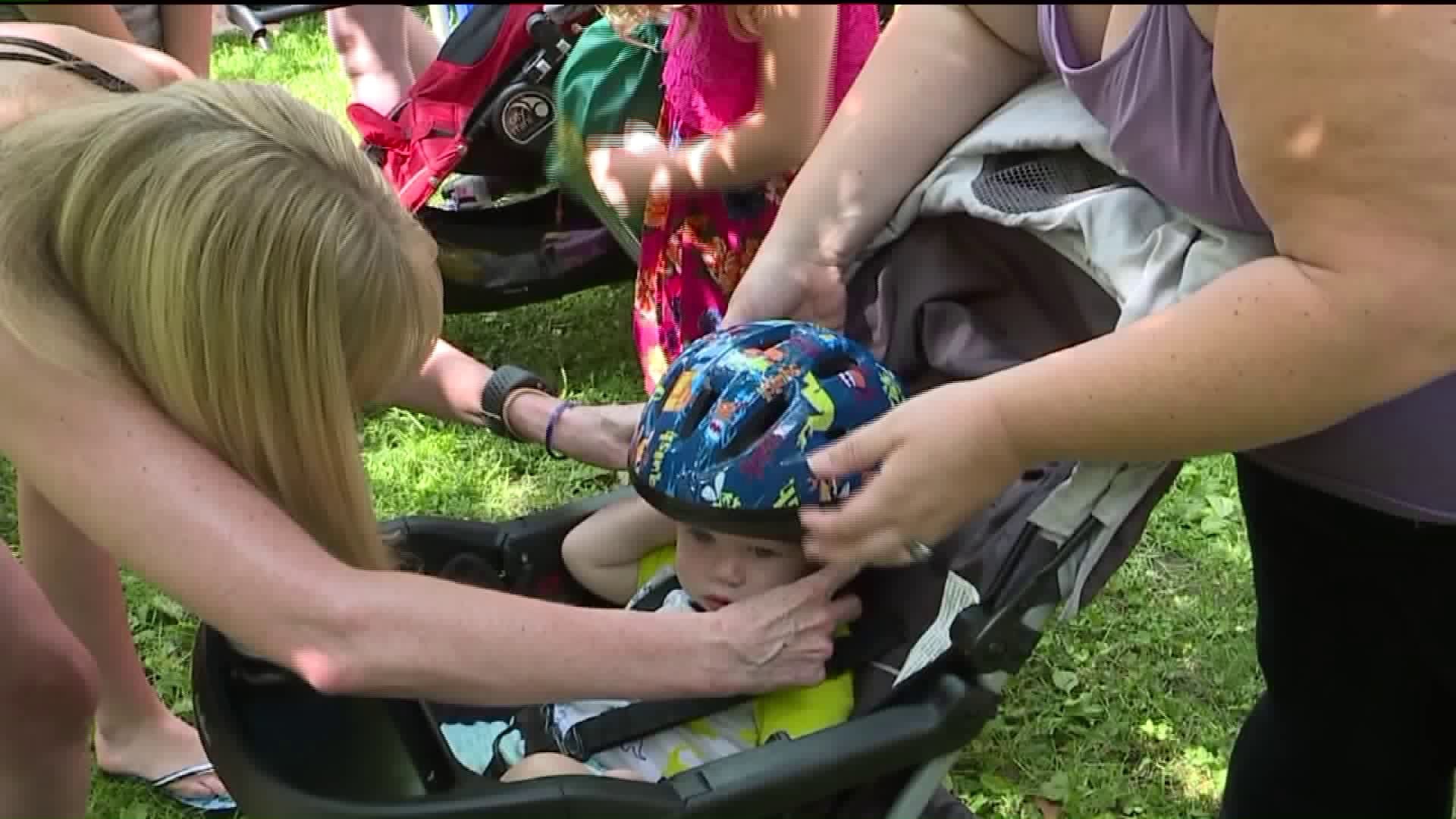 Bicycle Helmets Handed out to Children at Kirby Park