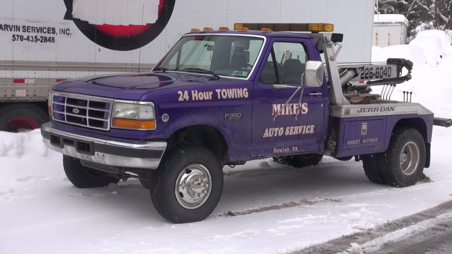 Bad road conditions mean busy days for towing companies even after the snow has stopped.