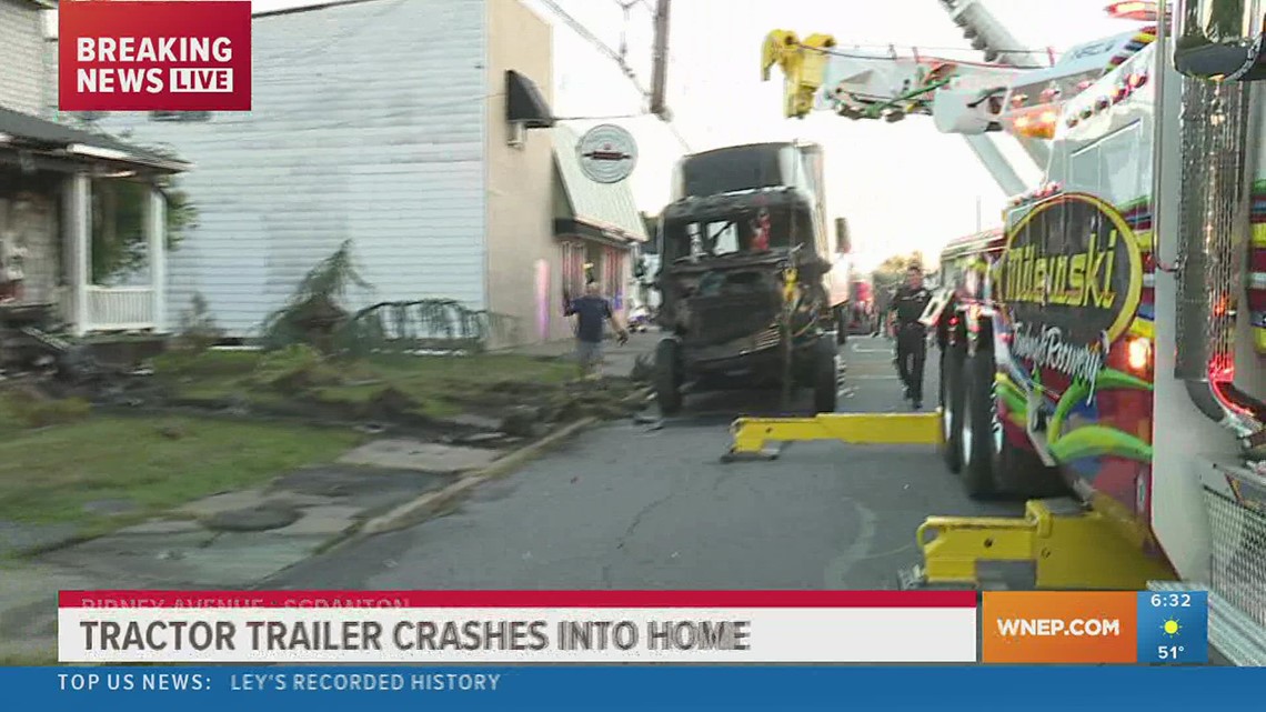 Tractor-trailer catches fire after crashing into a home in Scranton ...