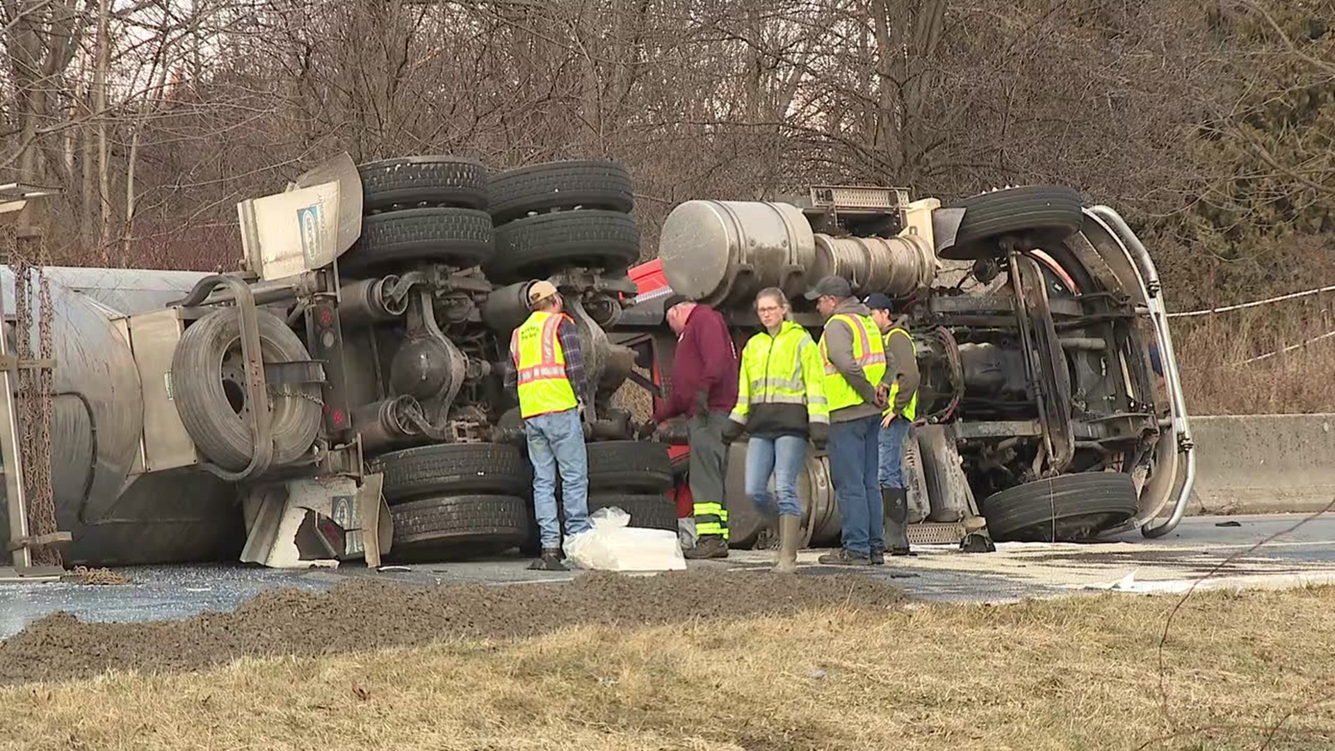 A truck carrying 50,000 pounds of milk overturned as it was getting on the Veterans Memorial Bridge.