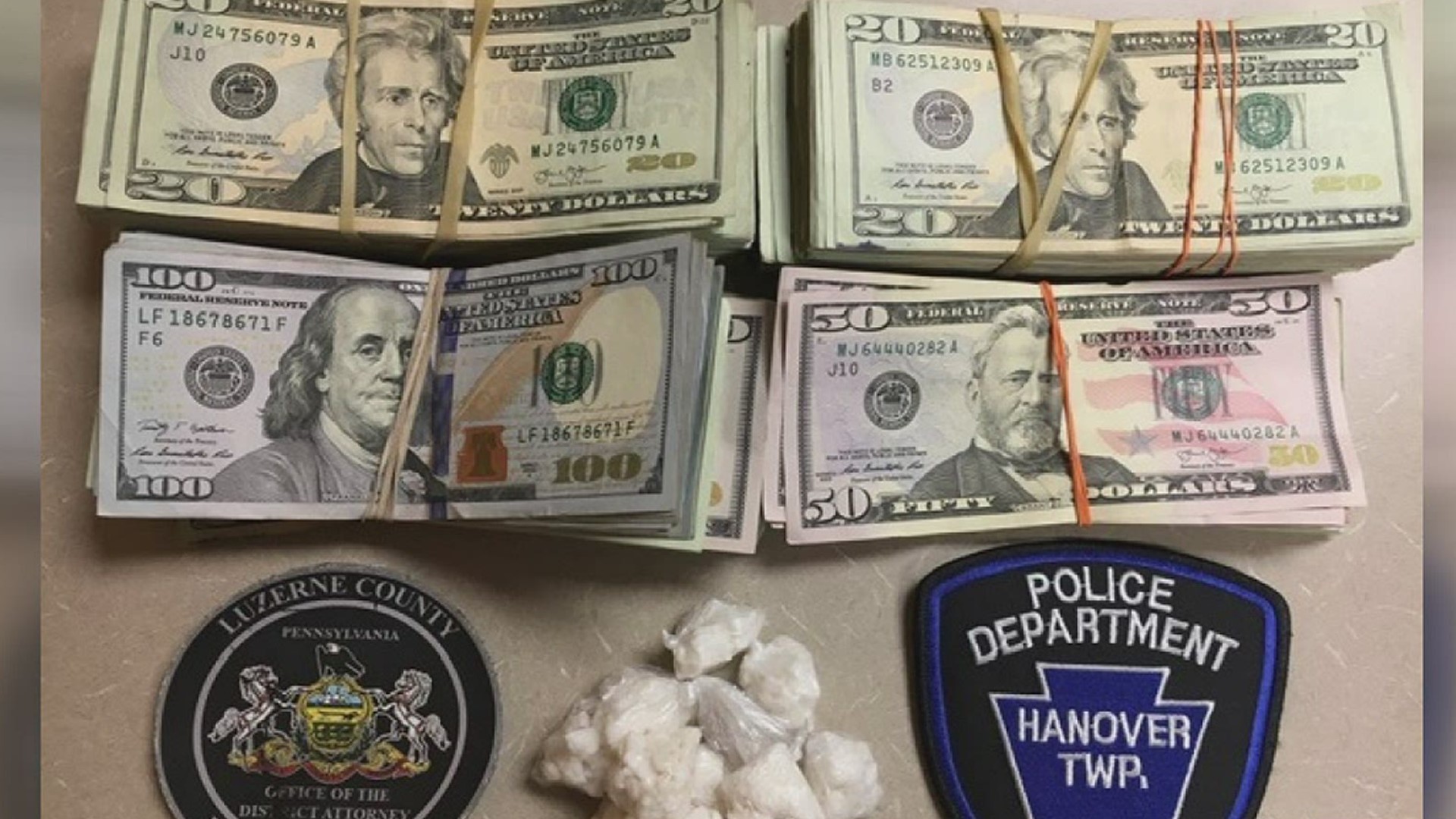 Police in Luzerne County say they seized drugs and $12,000 in cash from a home.