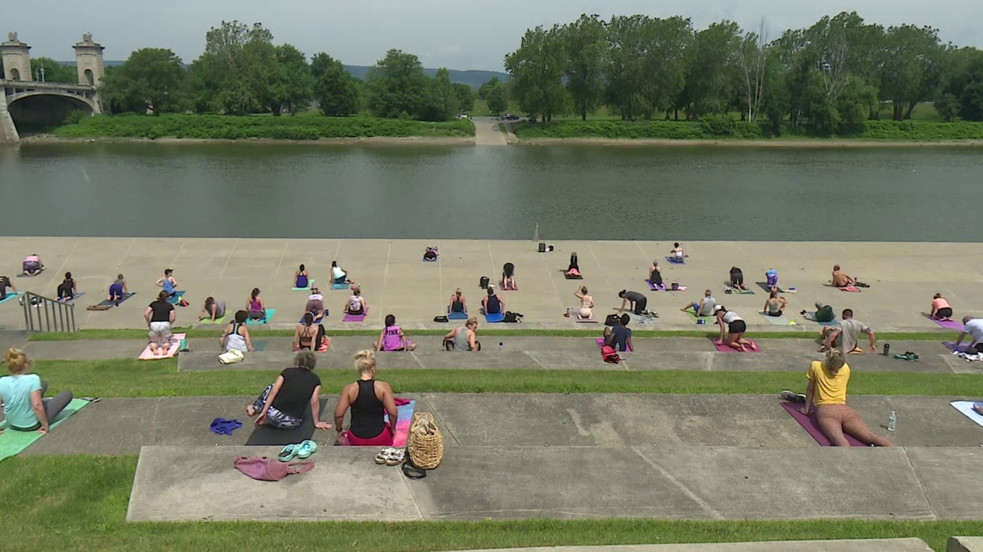 Yoga on the River Common is back for the season.