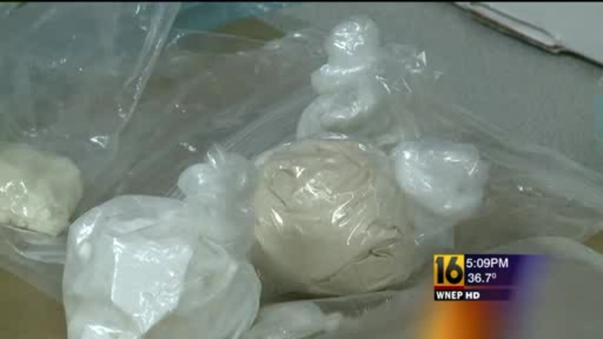 Drug Raid Nets Heroin, Weapons and Suspects