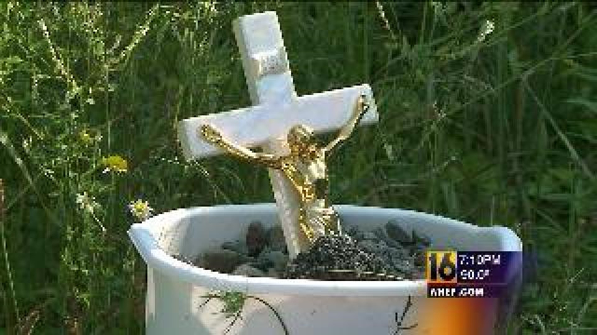 New Cross Appears at Memorial Site for Murdered Newborn
