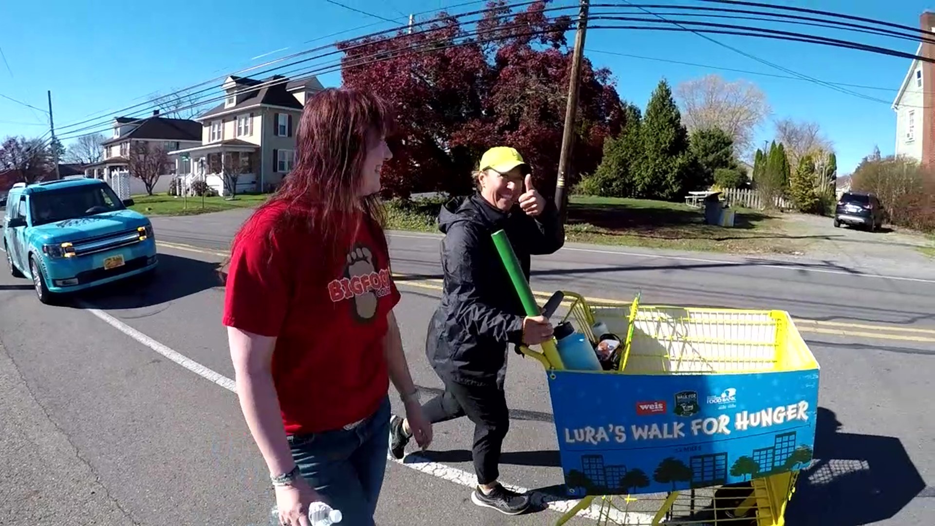If you're driving through parts of central Pennsylvania over the next few days, you might see a woman pushing a yellow shopping cart.