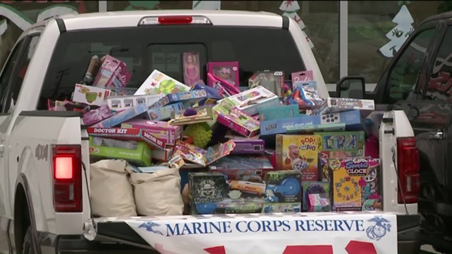 Nine Pickup Trucks Filled for Toys For Tots