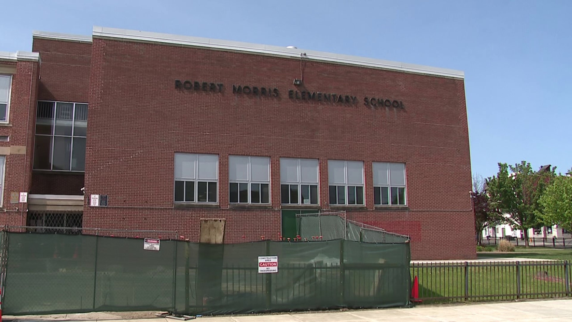 Robert Morris Elementary School will remain a polling location Tuesday despite asbestos being found inside the building.