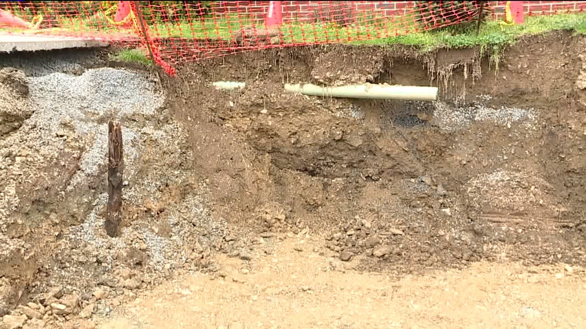Construction Crew Uncovers Grave Marker