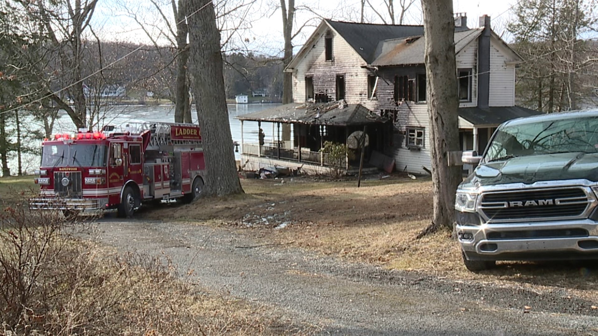 Flames broke out around noon Sunday at the home along East Shore Drive in Lake Ariel.