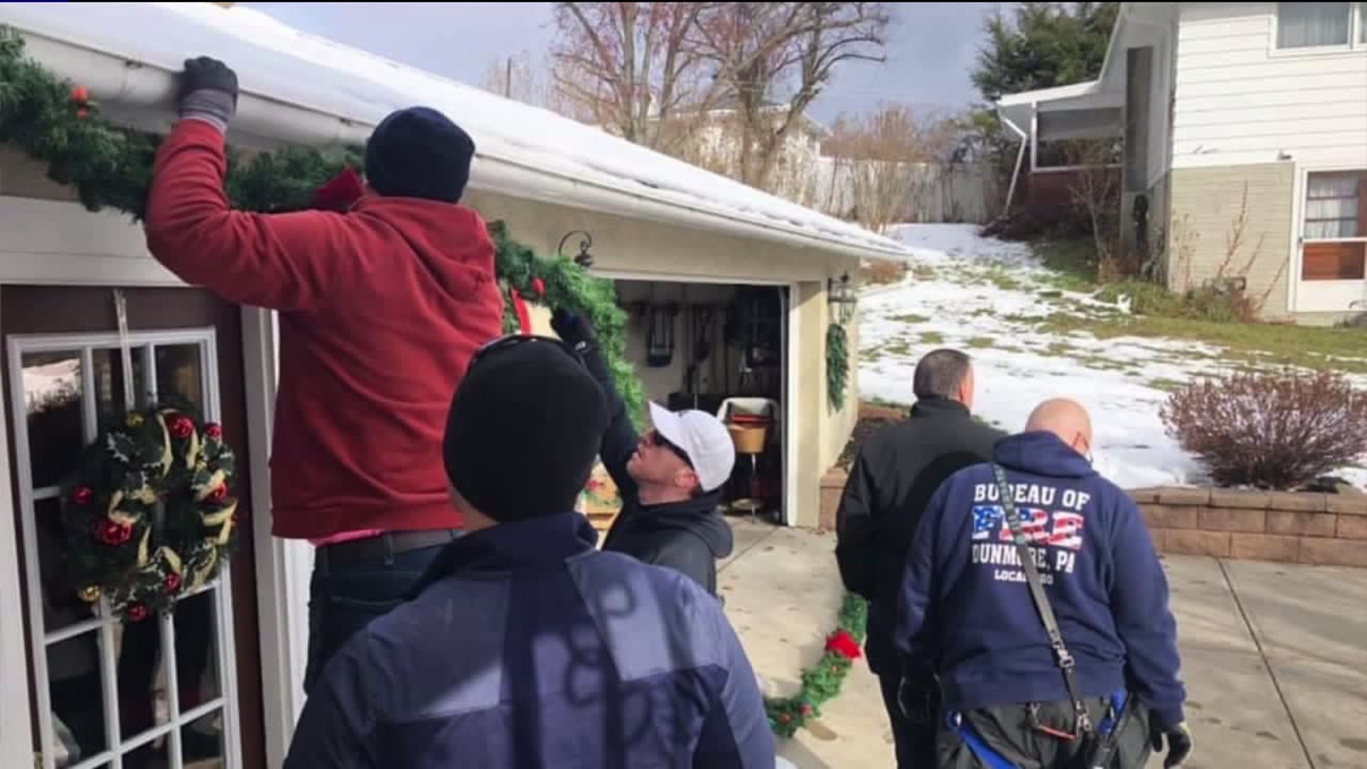 Dunmore Cops, Firefighters Deck the Halls of Stroke Victim`s Home