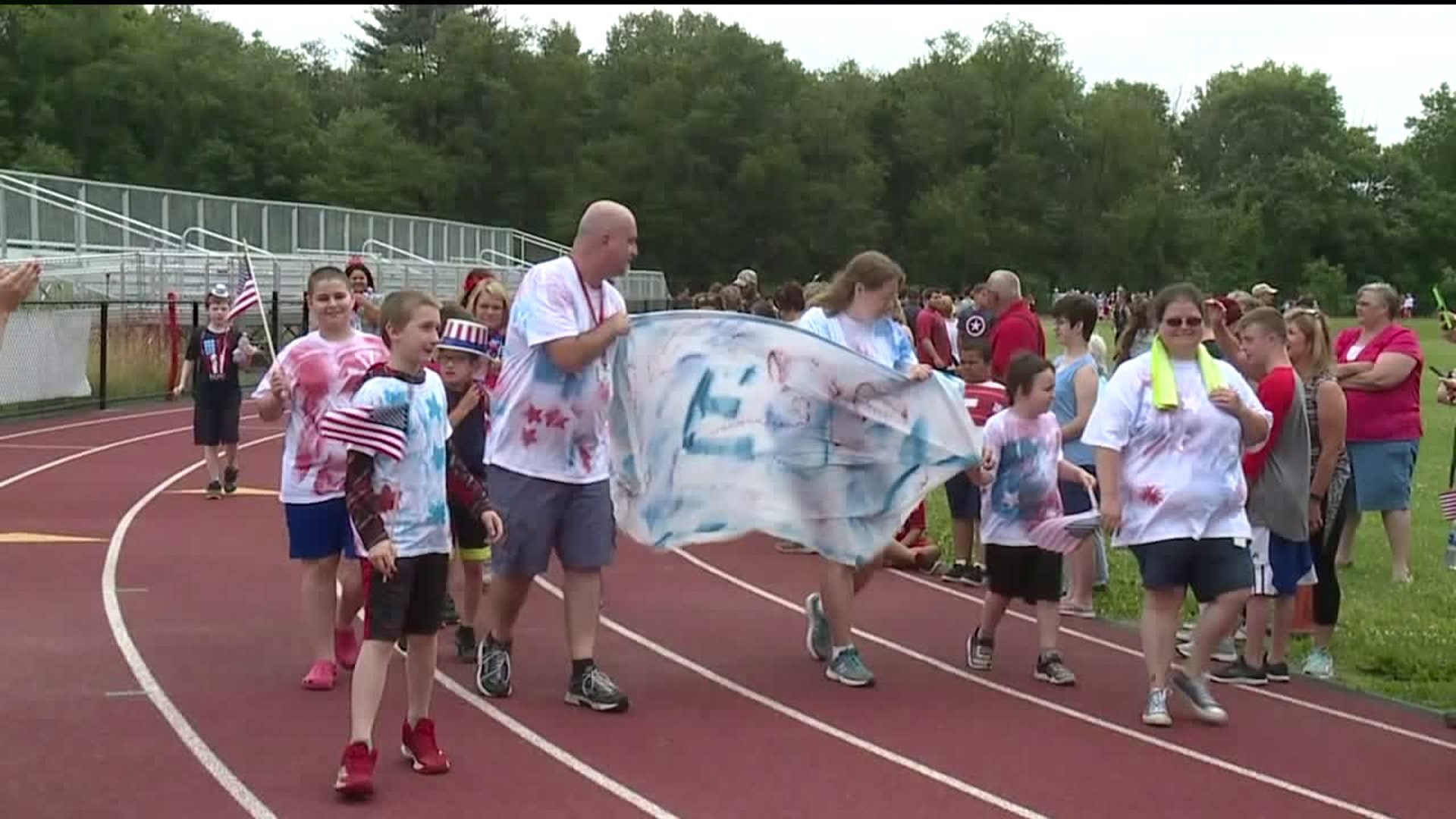 Students with Special Needs March in Parade