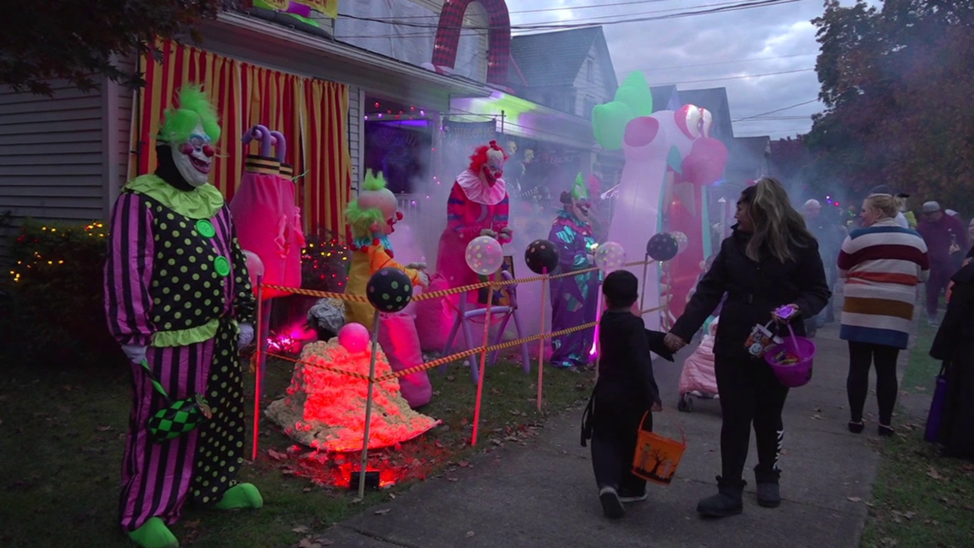 Families lined the sidewalks across the borough for candy and a look at the spooky displays.