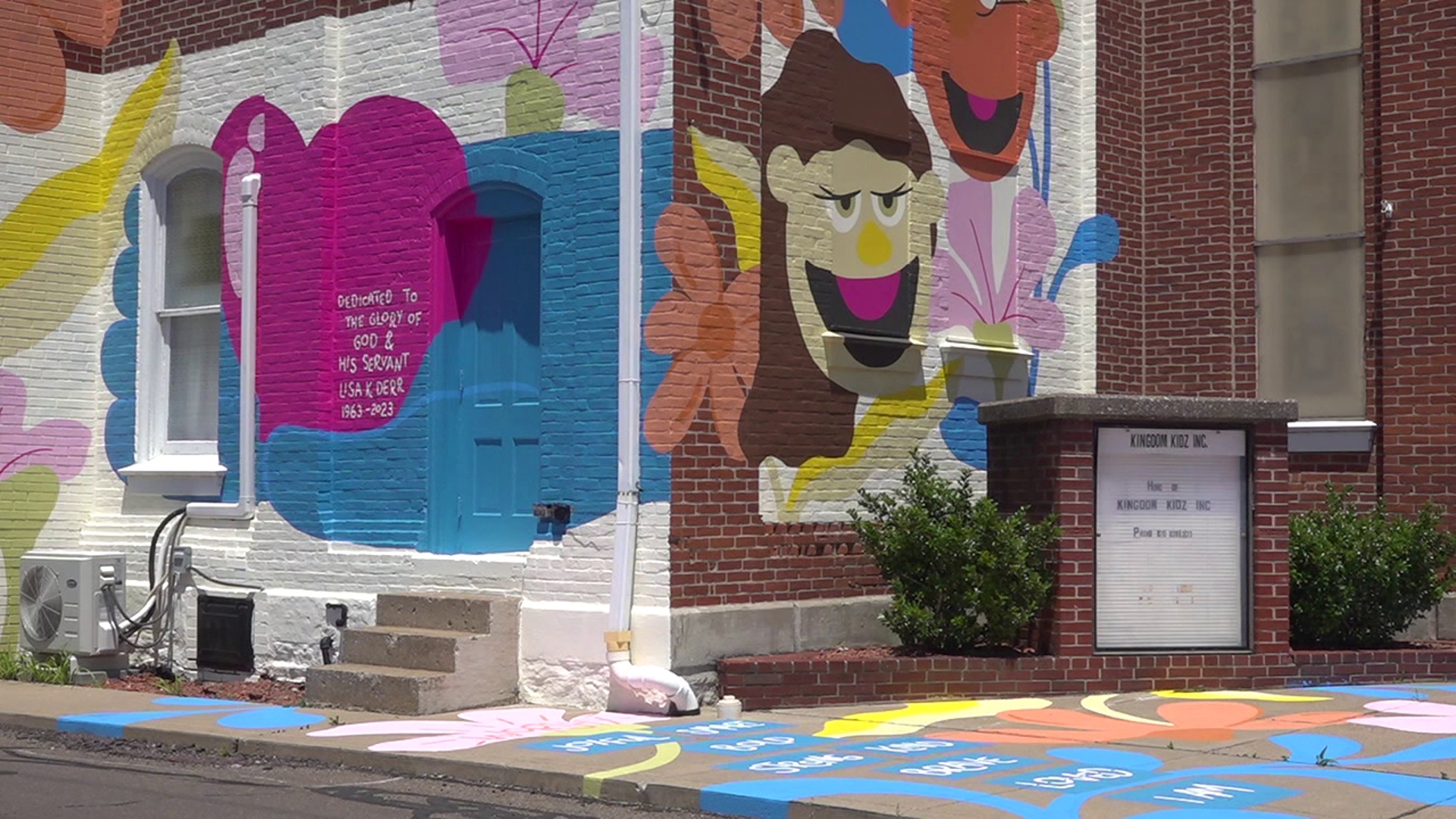 A mural in memory of a group's former general manager at Kingdom Kidz along East 3rd Street in Watsontown is finished.