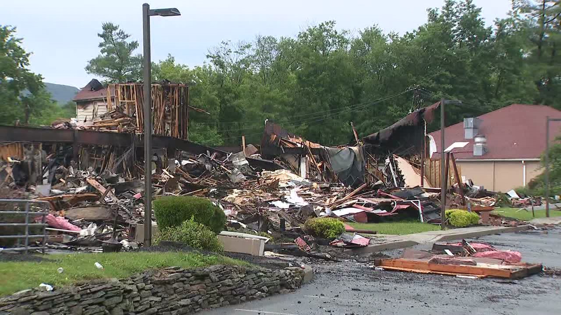 Township officials say the fire reignited two more times overnight.