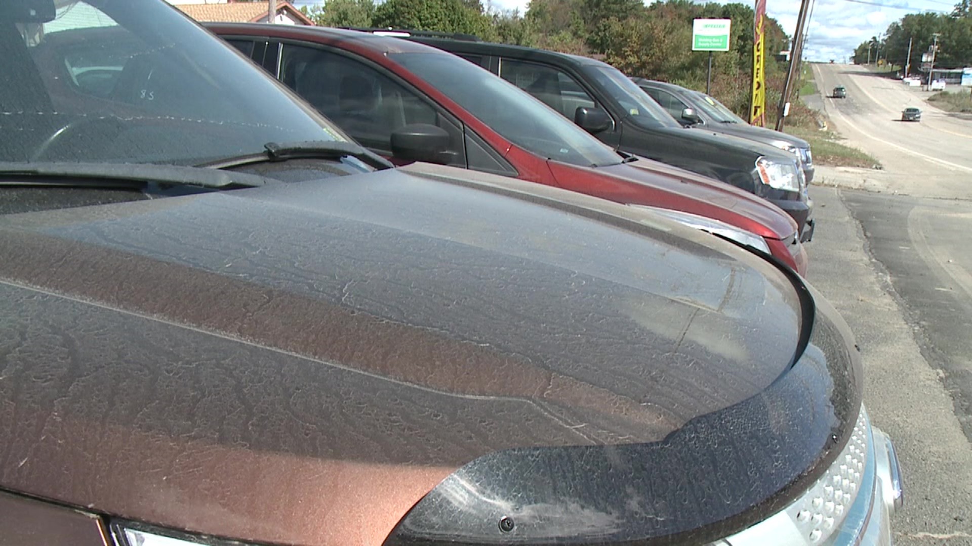 Two used car businesses say a neighboring construction project is hurting their business.
