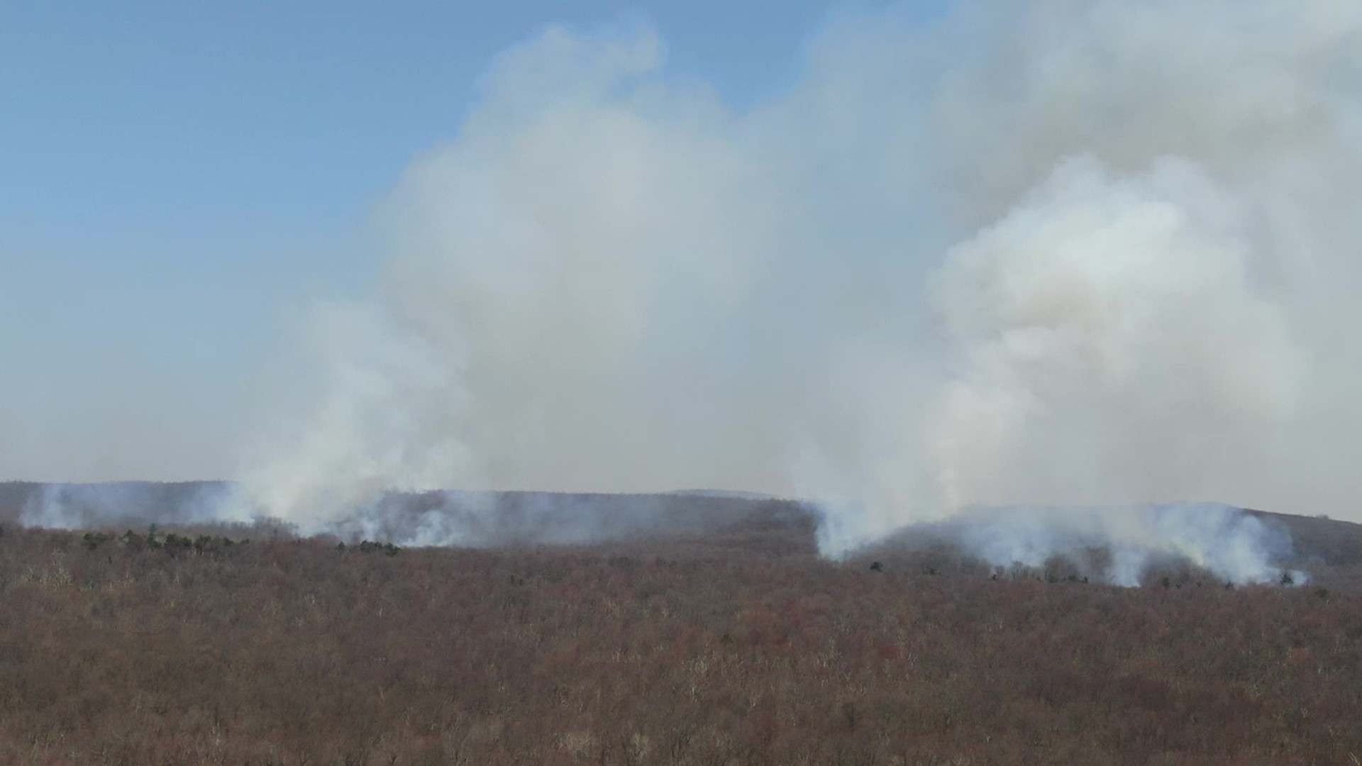 The fire sparked in a wooded area near Crystal Lake in Bear Creek Township.