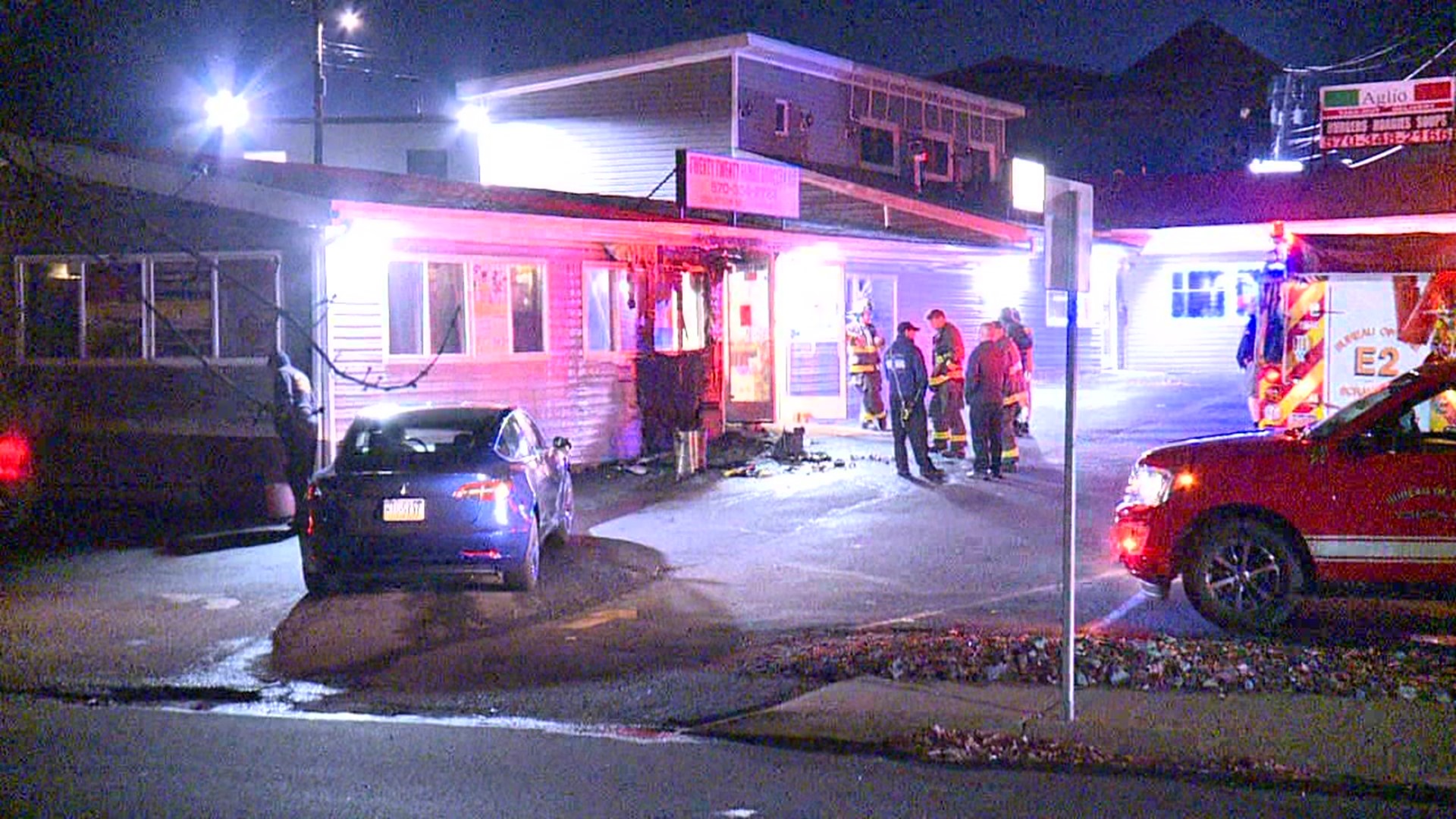 Flames damaged the siding of the store on Pittston Avenue late Thursday night.