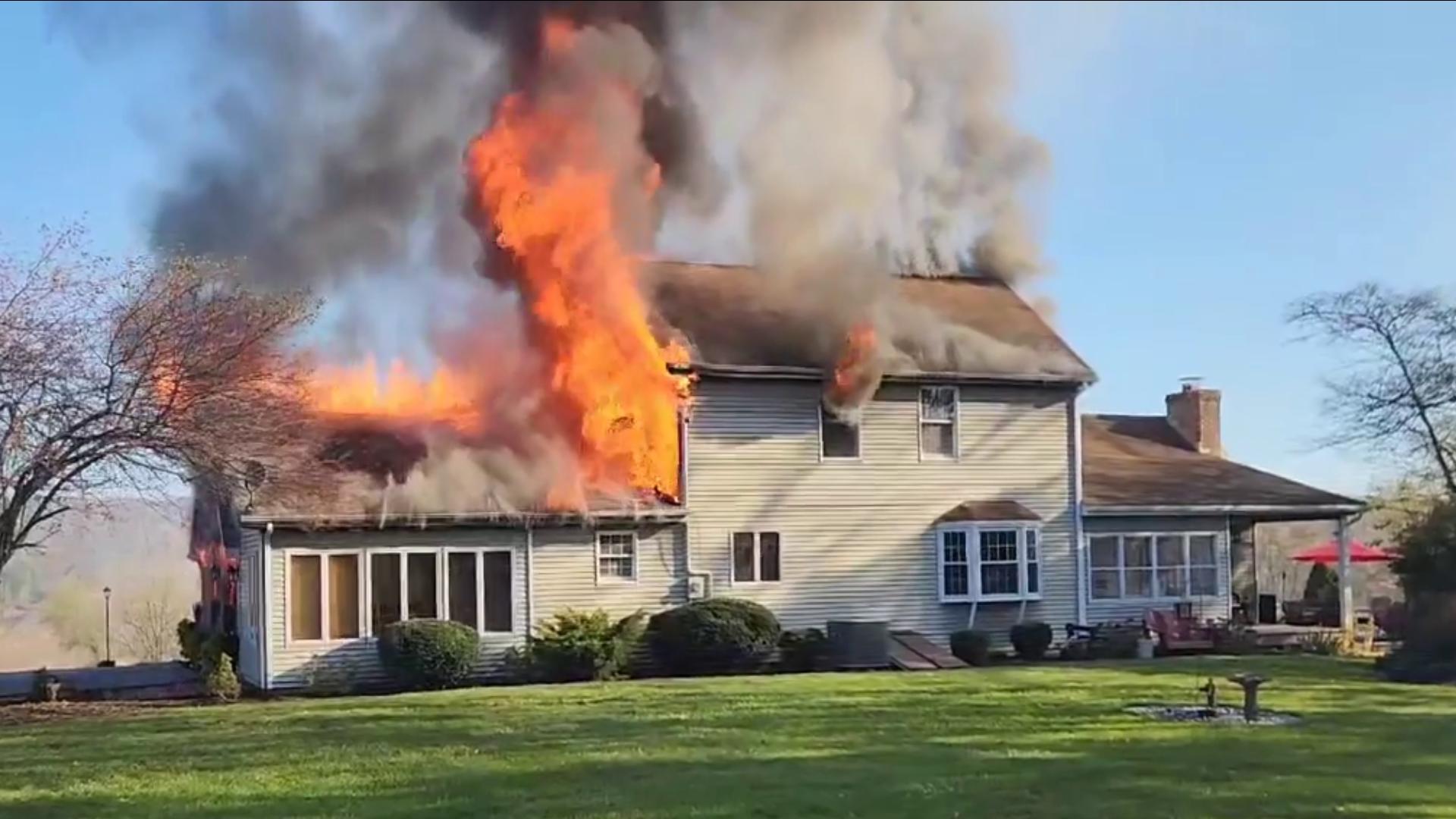 Flames broke out at the home in Valley Township around 9:30 a.m. Thursday.