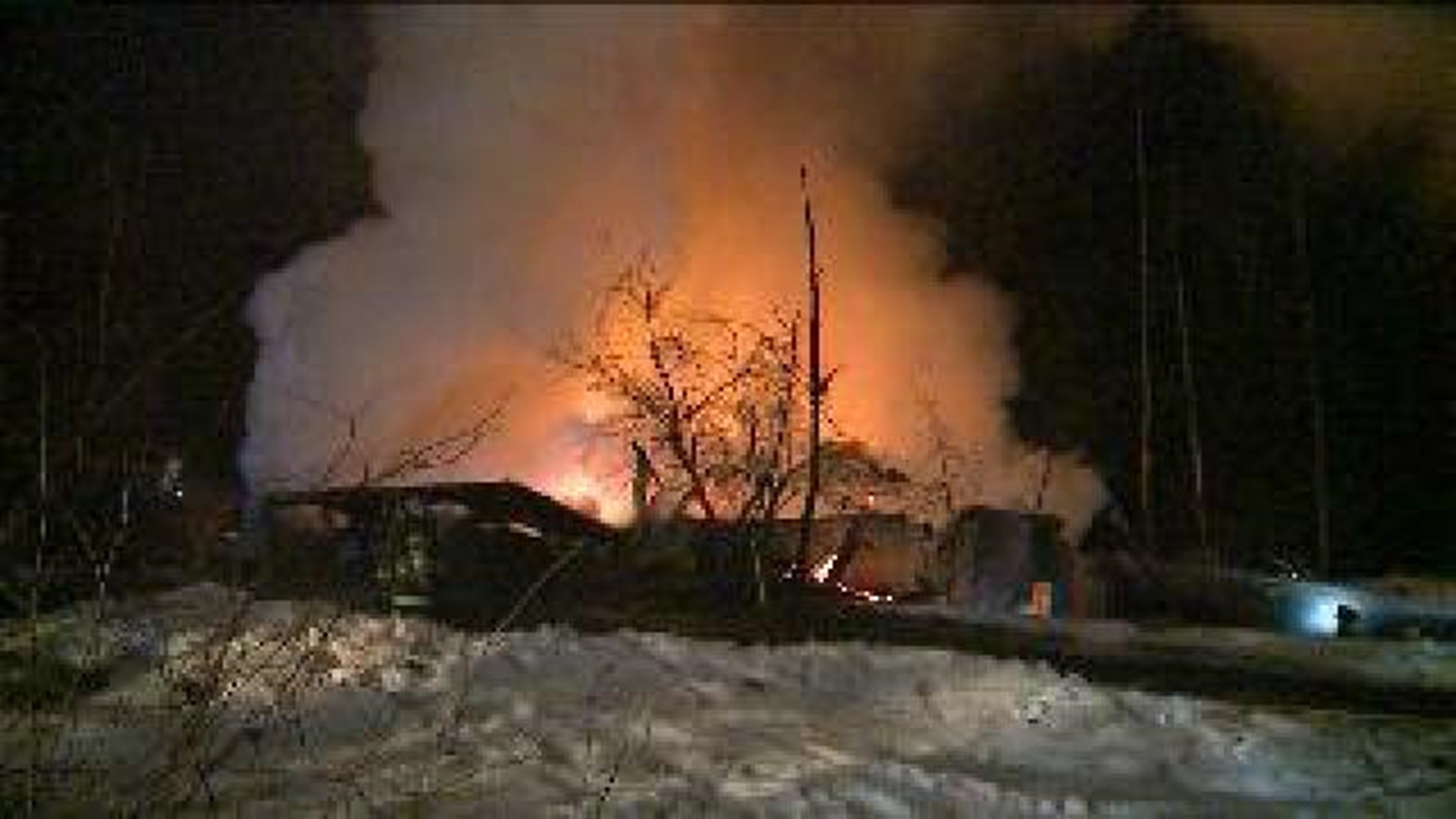Fire Crews Battle Flames in Snow and Ice