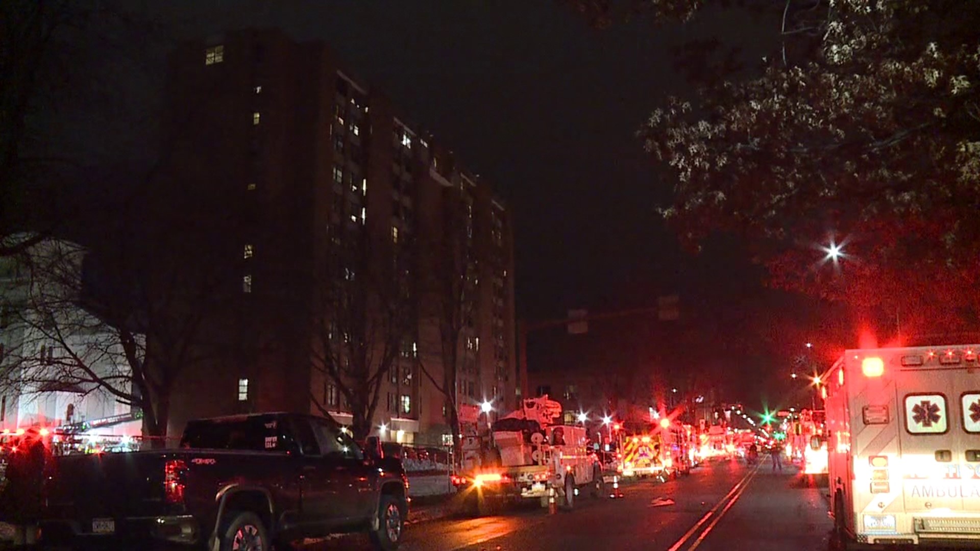 Officials and residents look back after a fire sparked at B’nai B’rith Senior Apartments last Thursday.