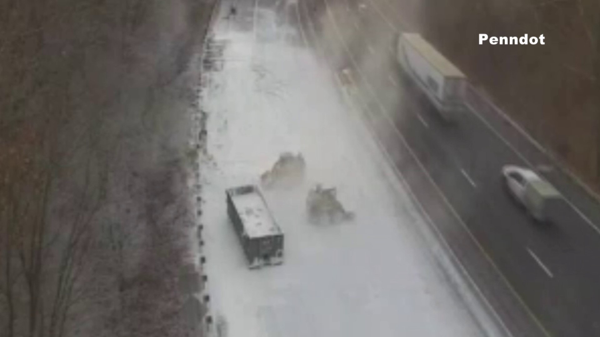 A tractor-trailer hauling Calcium Hydroxide overturned spilling its load on the highway.