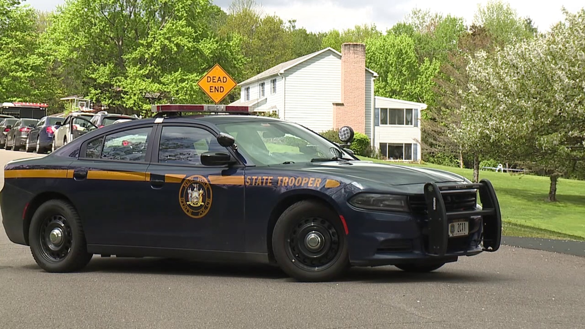 A heavy police presence continues Sunday evening at a home associated with the alleged shooter located in Conklin, New York.