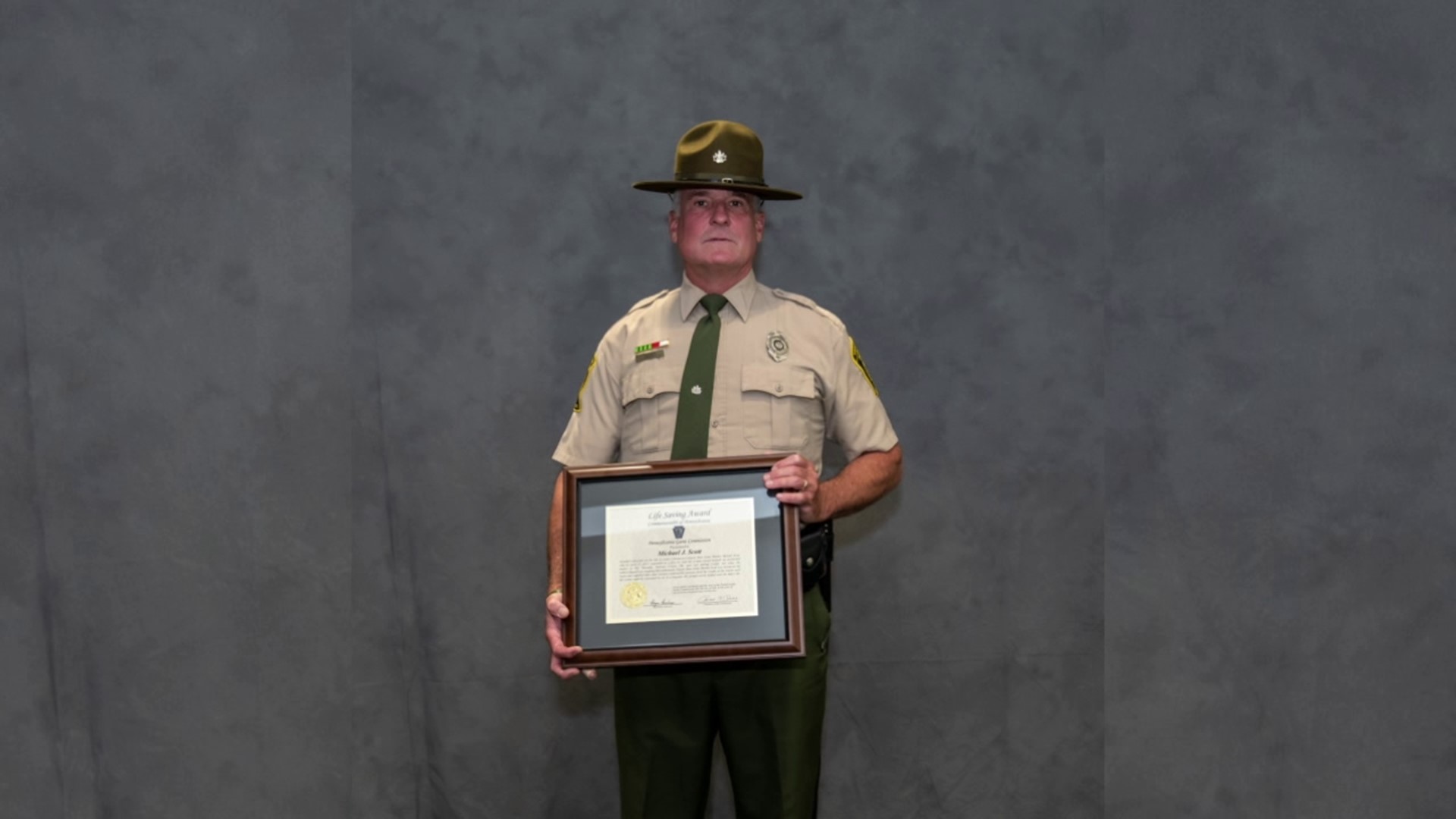 Deputy Michael Scott was honored with a Life Saving Award in Harrisburg for helping a man whose tractor flipped over on him.