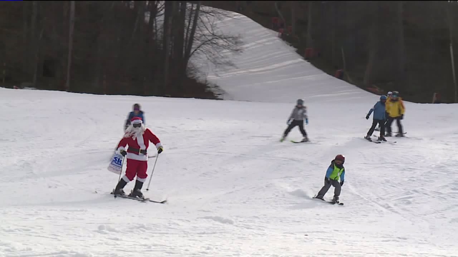 Santa Dashes Through the Snow on Some Skis in Monroe County
