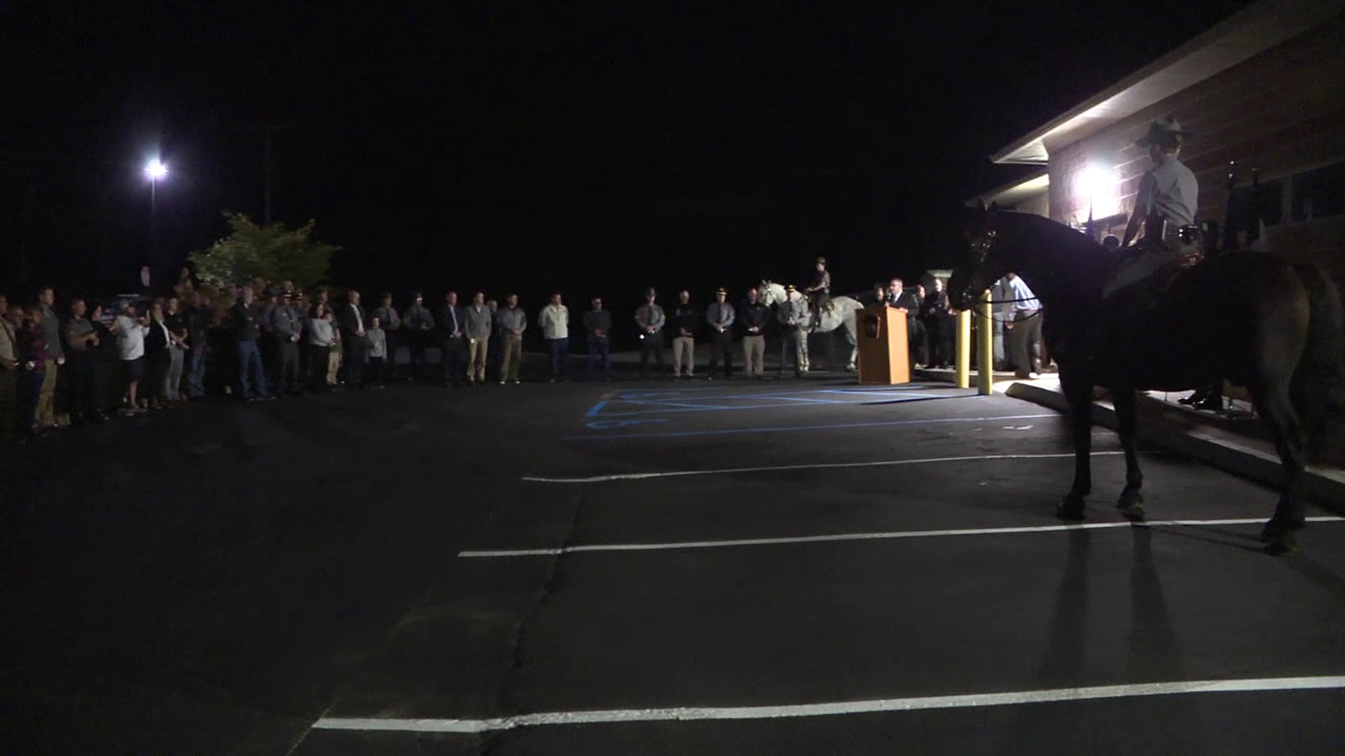 Every year since the attack at the state police barracks, Corporal Bryon Dickson's family members have held a candlelight vigil in Pike County.