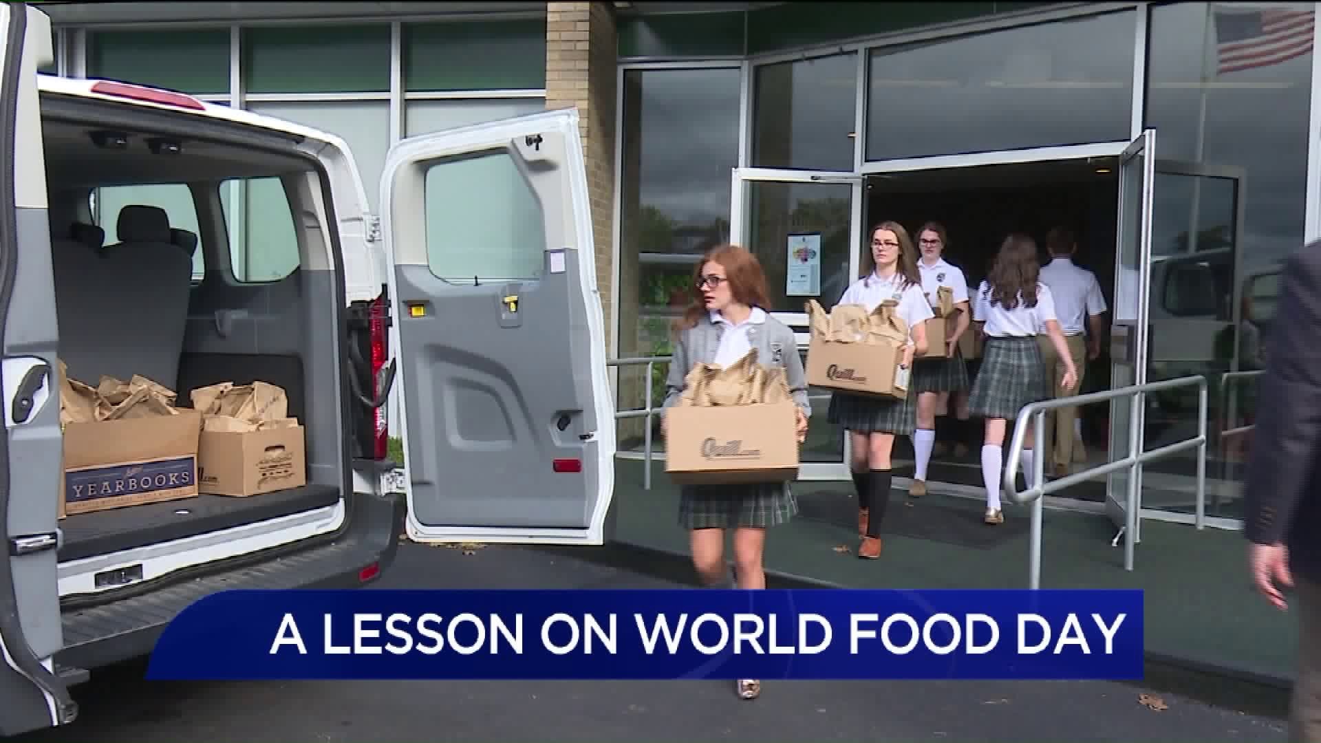 Holy Cross High School Gives Out 200 Meals on World Food Day