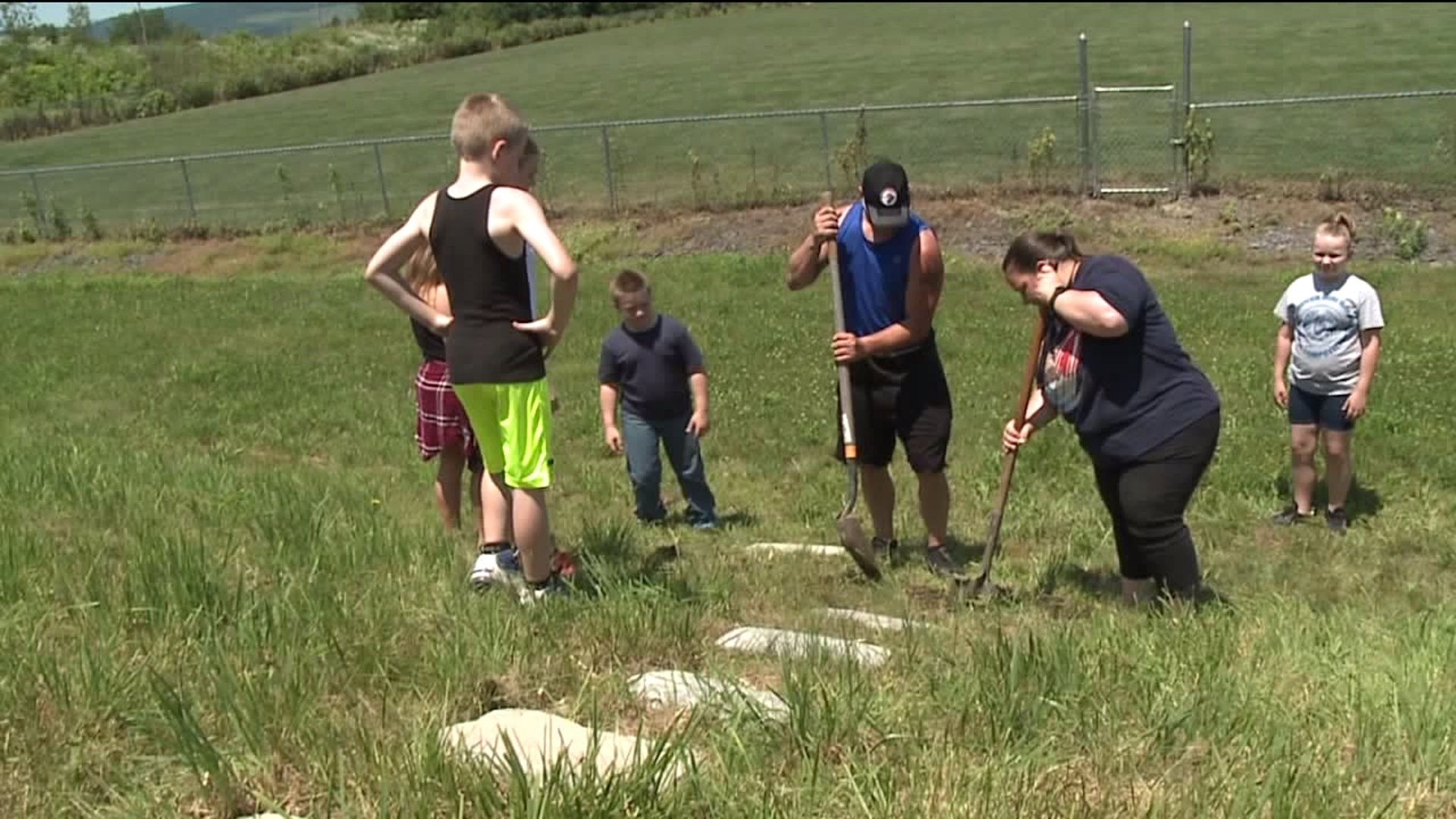 Volunteers Spruce up Ball Field in Hanover Township