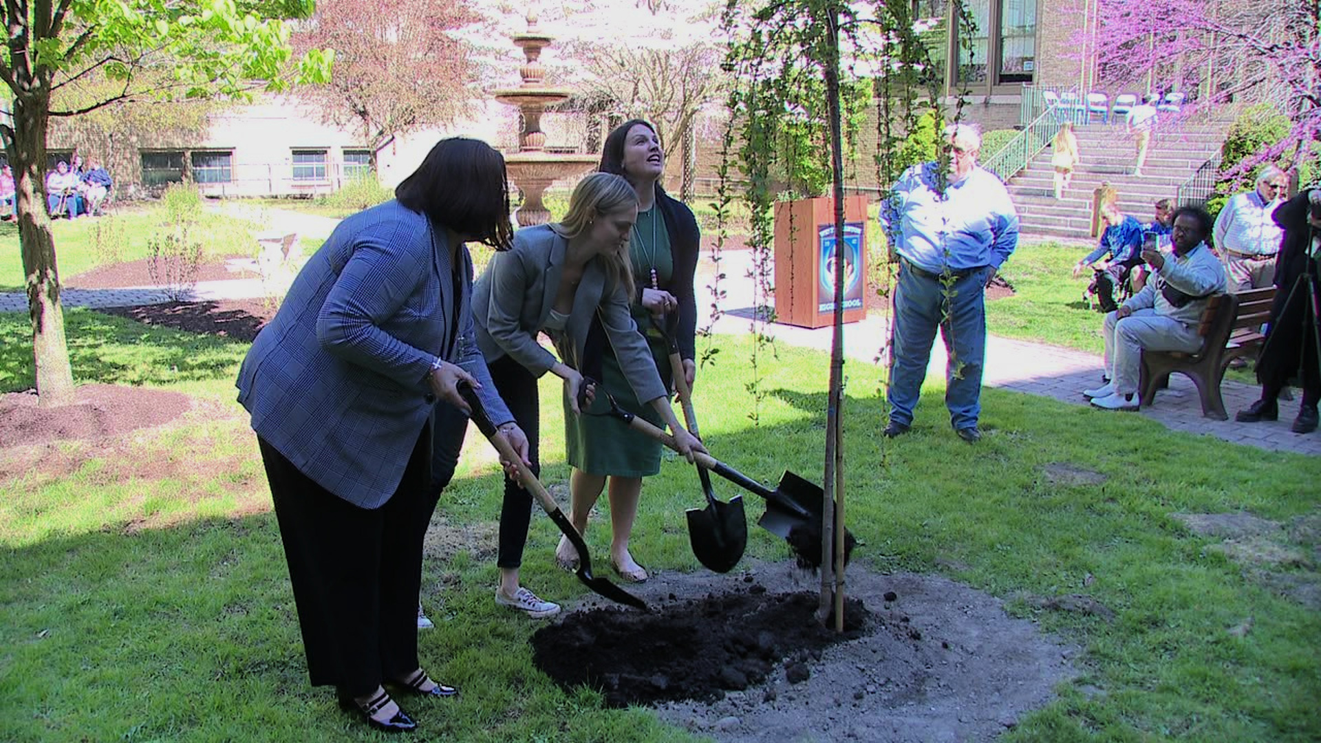 School and city leaders gathered at the high school on Friday for the Arbor Day observance.