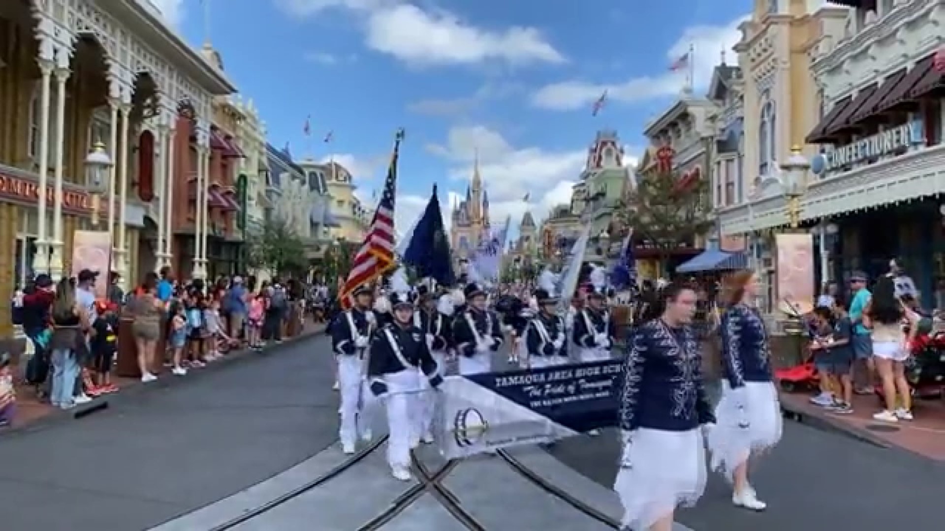 The 164 members of the band marched down Disney's Main Street USA.