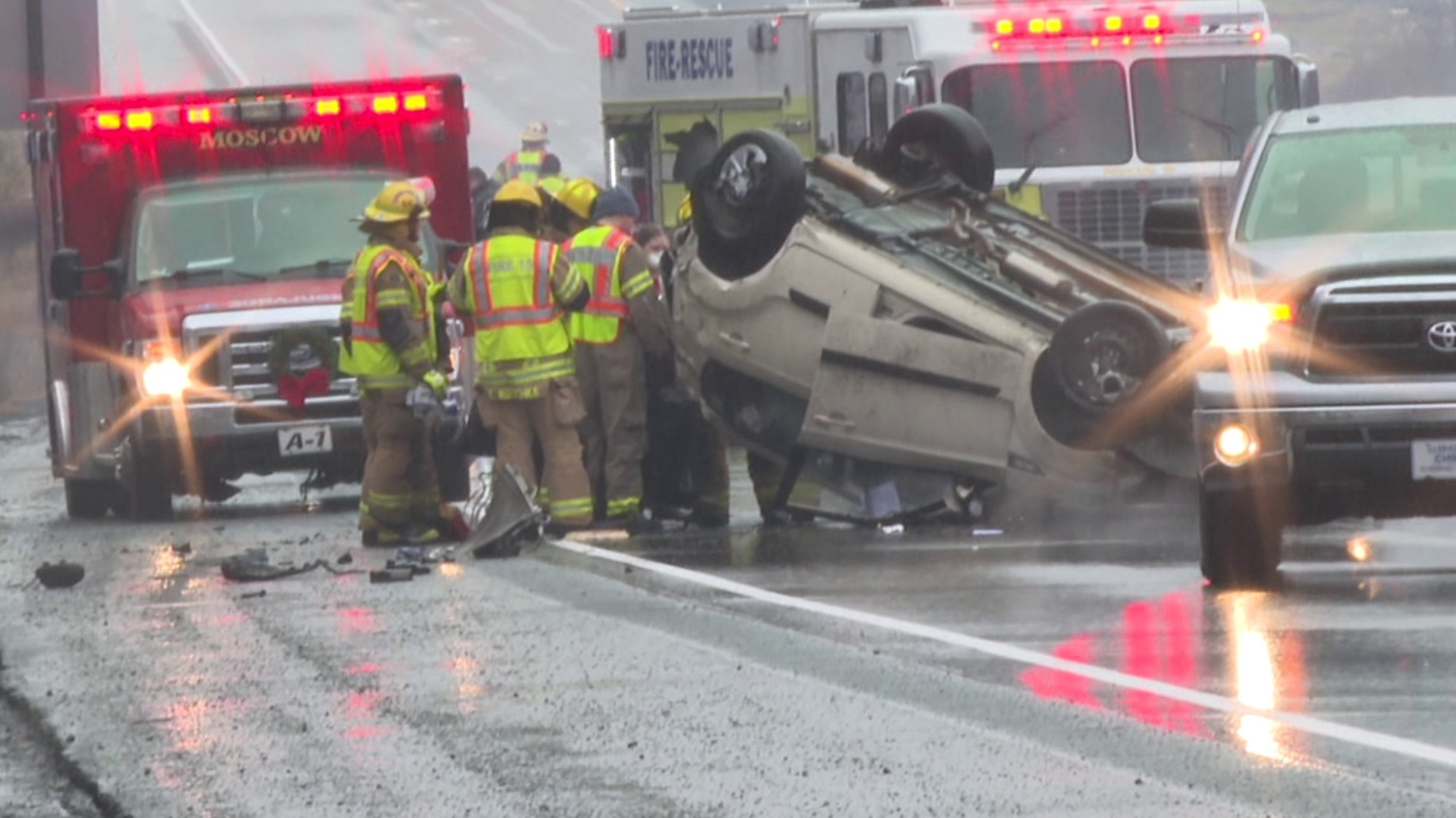 A car flipped over in the eastbound lanes of Interstate 84 in Elmhurst Township, near Moscow, on Saturday morning.