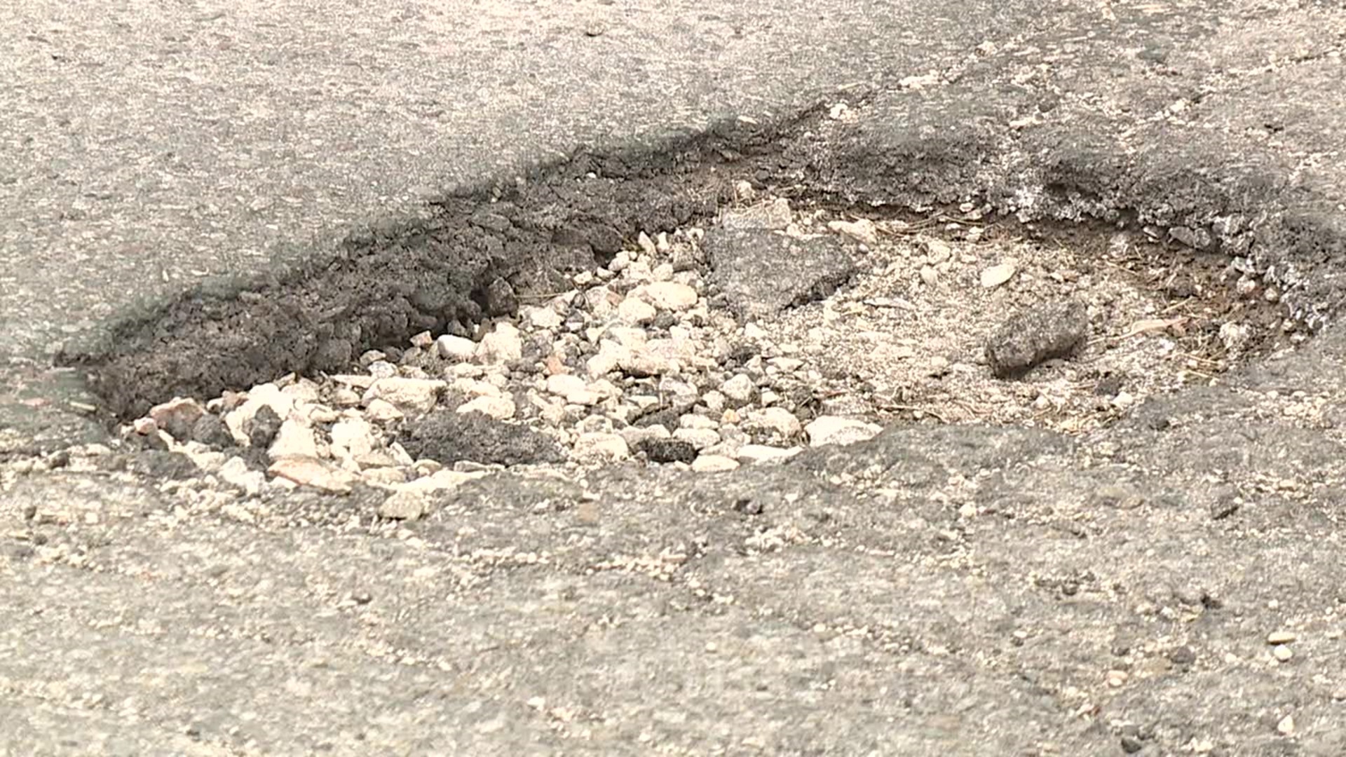 Is there a pothole ruining your commute? There's now a hotline to report it if it's in the city.