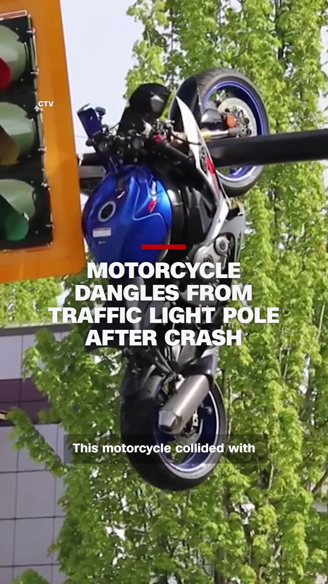 Motorcycle left dangling from traffic light pole after crash in Canada ...