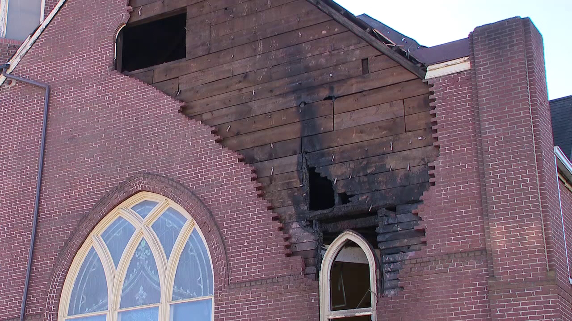 The crash between a ladder truck and car occurred on the crew's way to a church fire.